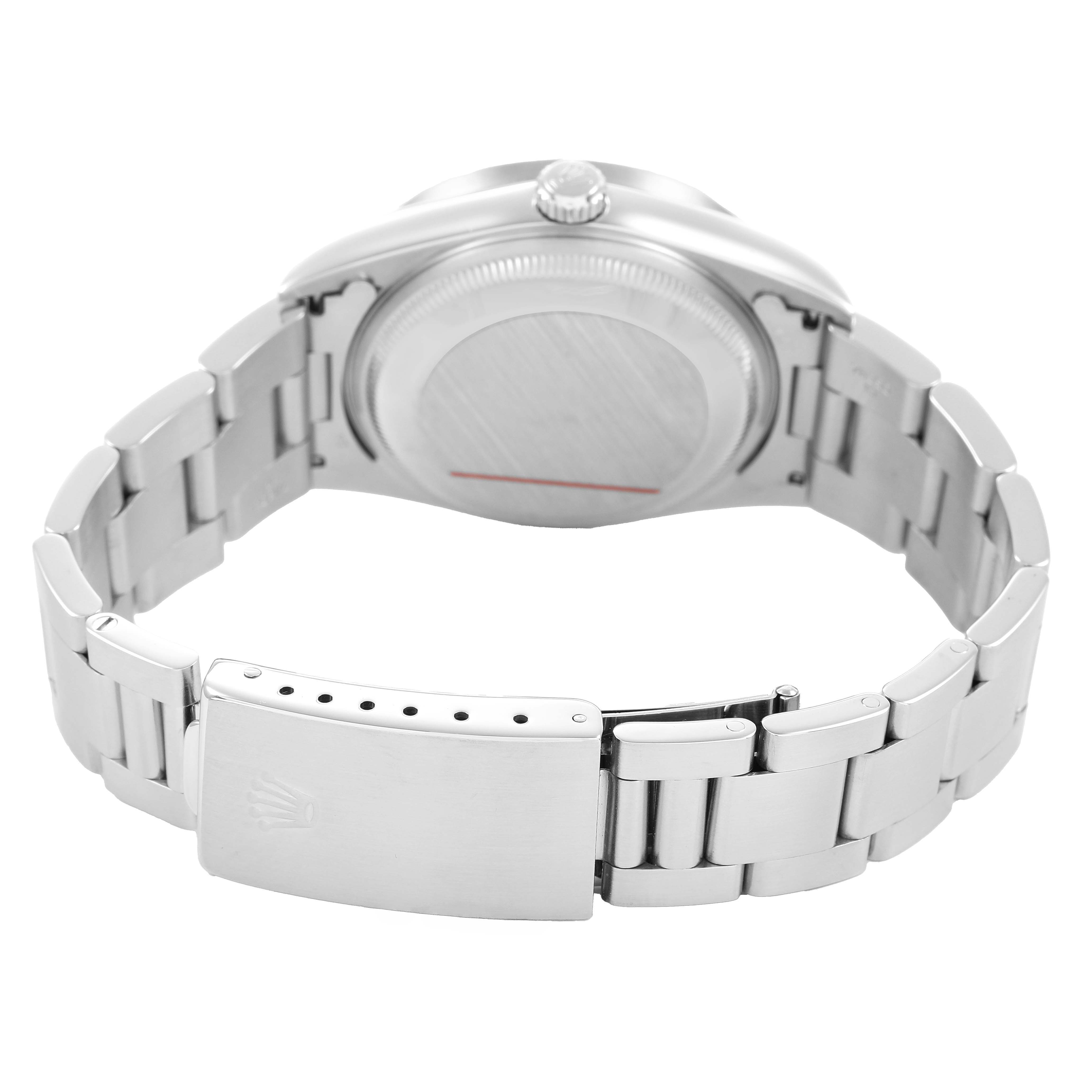 The image shows the back case and bracelet with clasp of a Rolex Date 15210 Men's Stainless Steel Blue Dial model watch, viewed from the rear.
