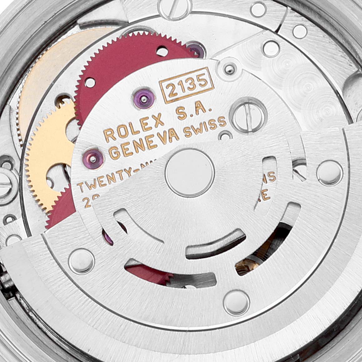 This is a close-up of the Rolex Date 69160 Women's Stainless Steel Pink Dial 69160 Women's Stainless Steel Pink Dial model's movement, showing intricate gears and the "Rolex S.A. Geneva Swiss" marking.