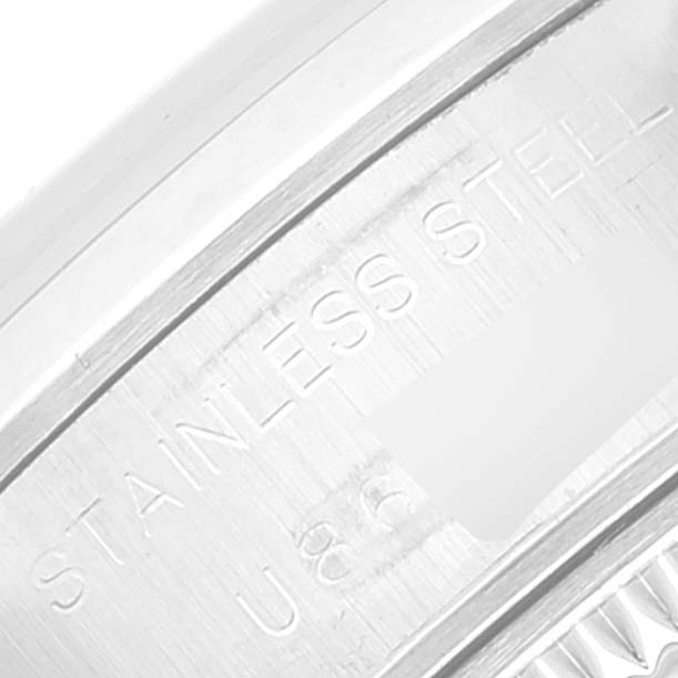 This image shows a close-up of the stainless steel marking on the case of a Rolex Date 69160 Women's Stainless Steel Pink Dial 69160 Women's Stainless Steel Pink Dial model watch.