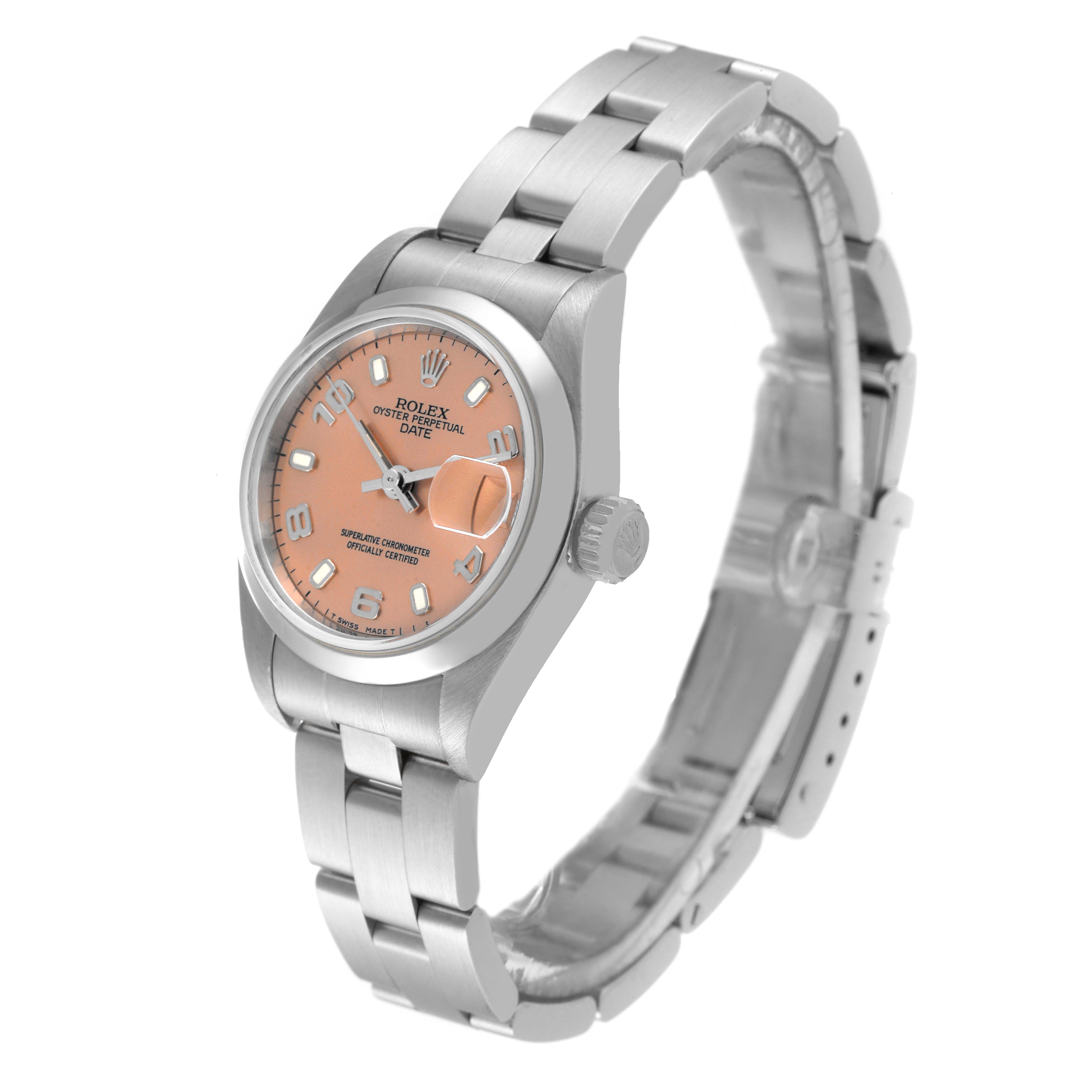 The Rolex Date 69160 Women's Stainless Steel Pink Dial 69160 Women's Stainless Steel Pink Dial model watch is shown from a front angle, displaying the face, bezel, crown, and bracelet.