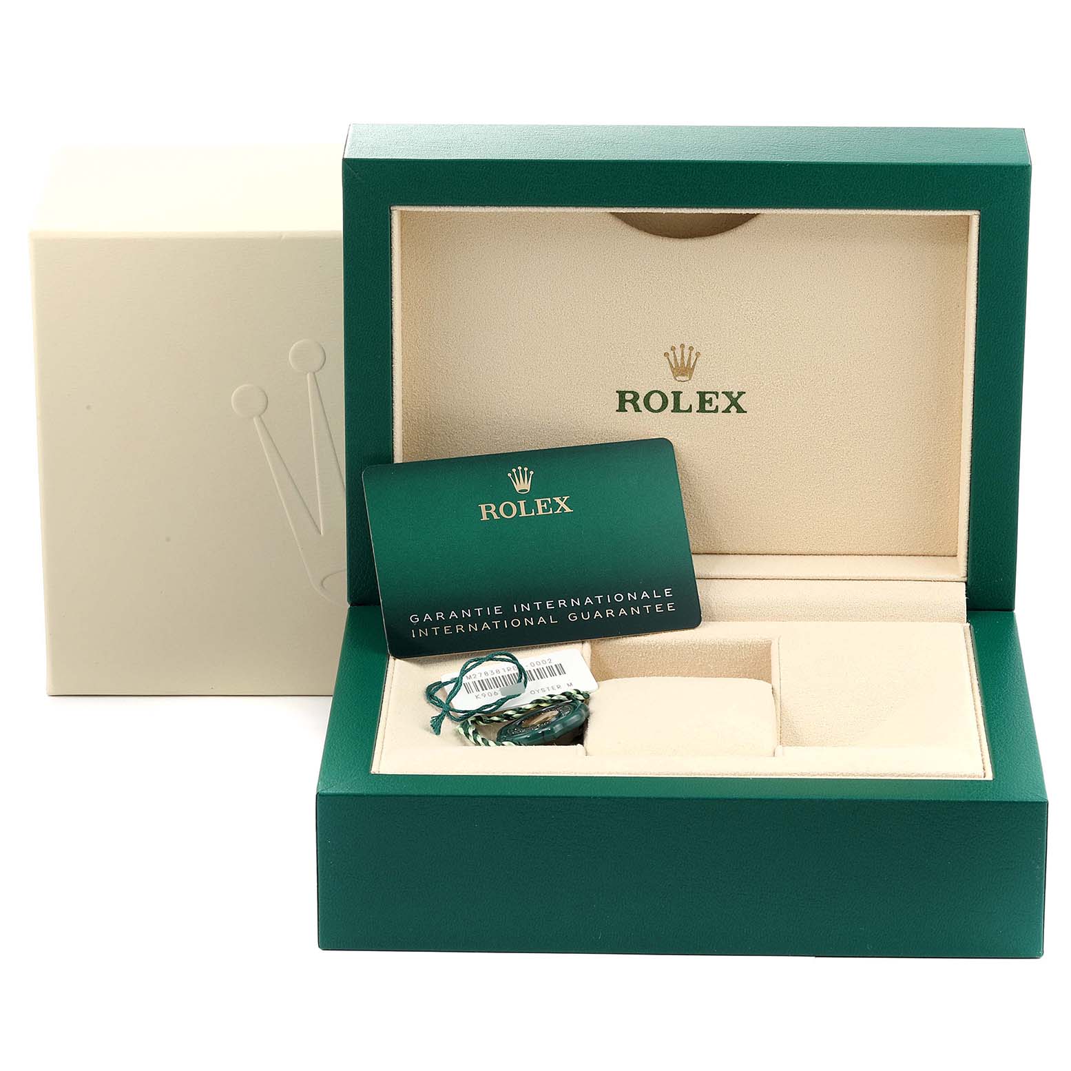 The image shows the open box of a Rolex Mid-Size 278381 Women's Steel and Gold (two tone) Purple Dial 278381 Women's Steel and Gold (two tone) Purple Dial watch, containing a warranty card and additional accessories.