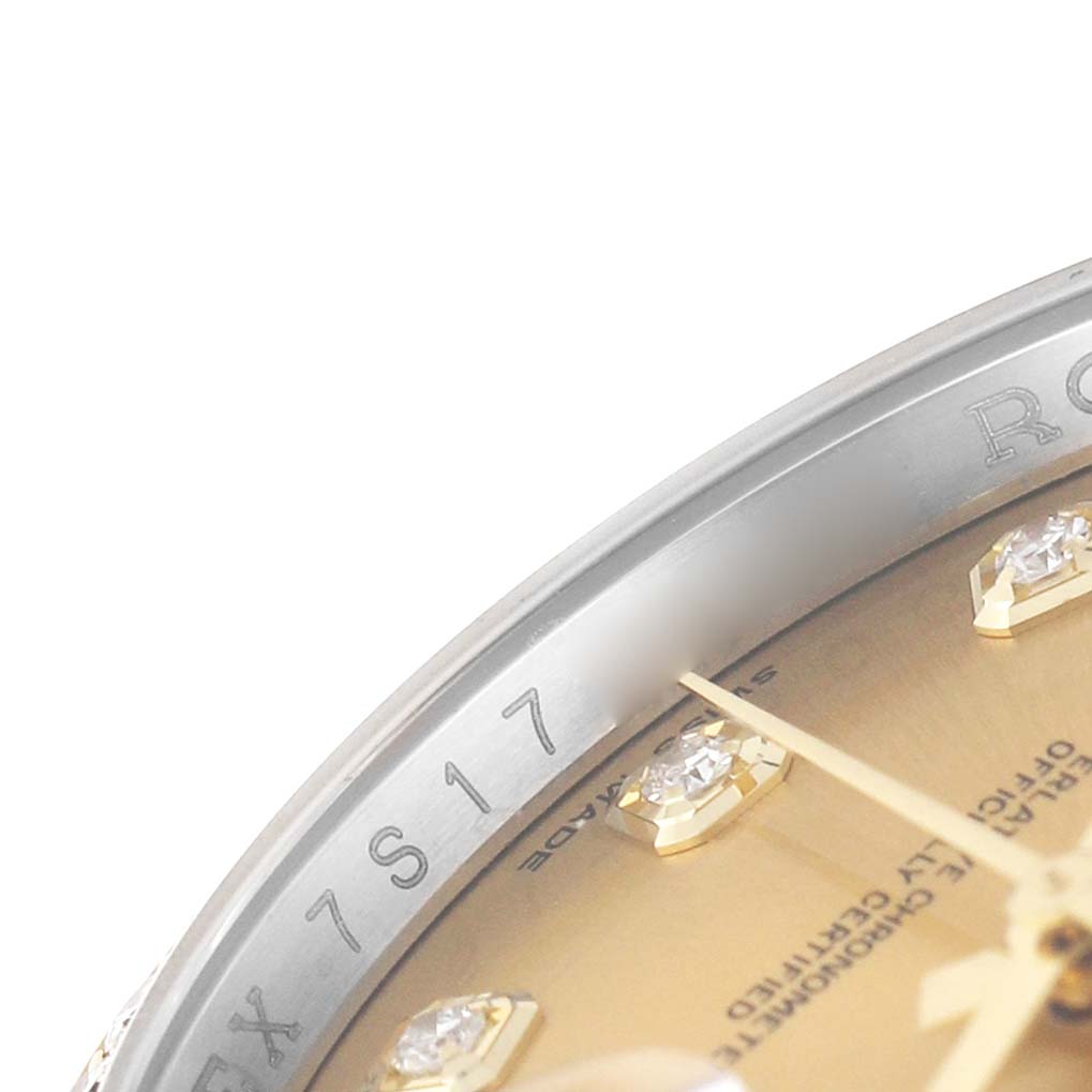 The image shows a close-up of the Rolex Datejust 116243 Men's Stainless Steel Champagne Dial watch face, highlighting the bezel engraving and diamond hour markers.
