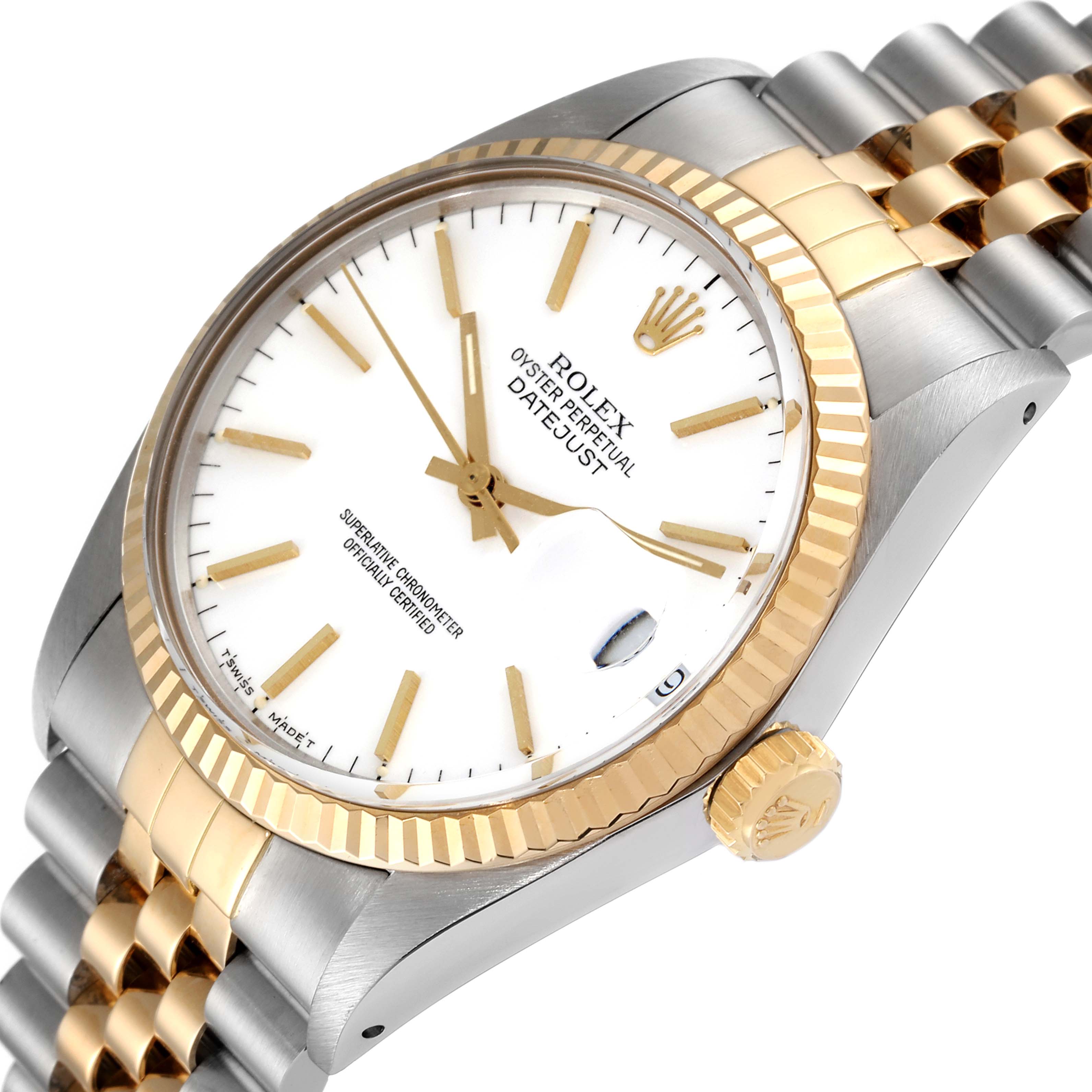 This angled shot of the Rolex Vintage Collection 16013 Men's Steel and Gold (two tone) White Dial 16013 Men's Steel and Gold (two tone) White Dial model shows the white dial, gold fluted bezel, and two-tone bracelet.