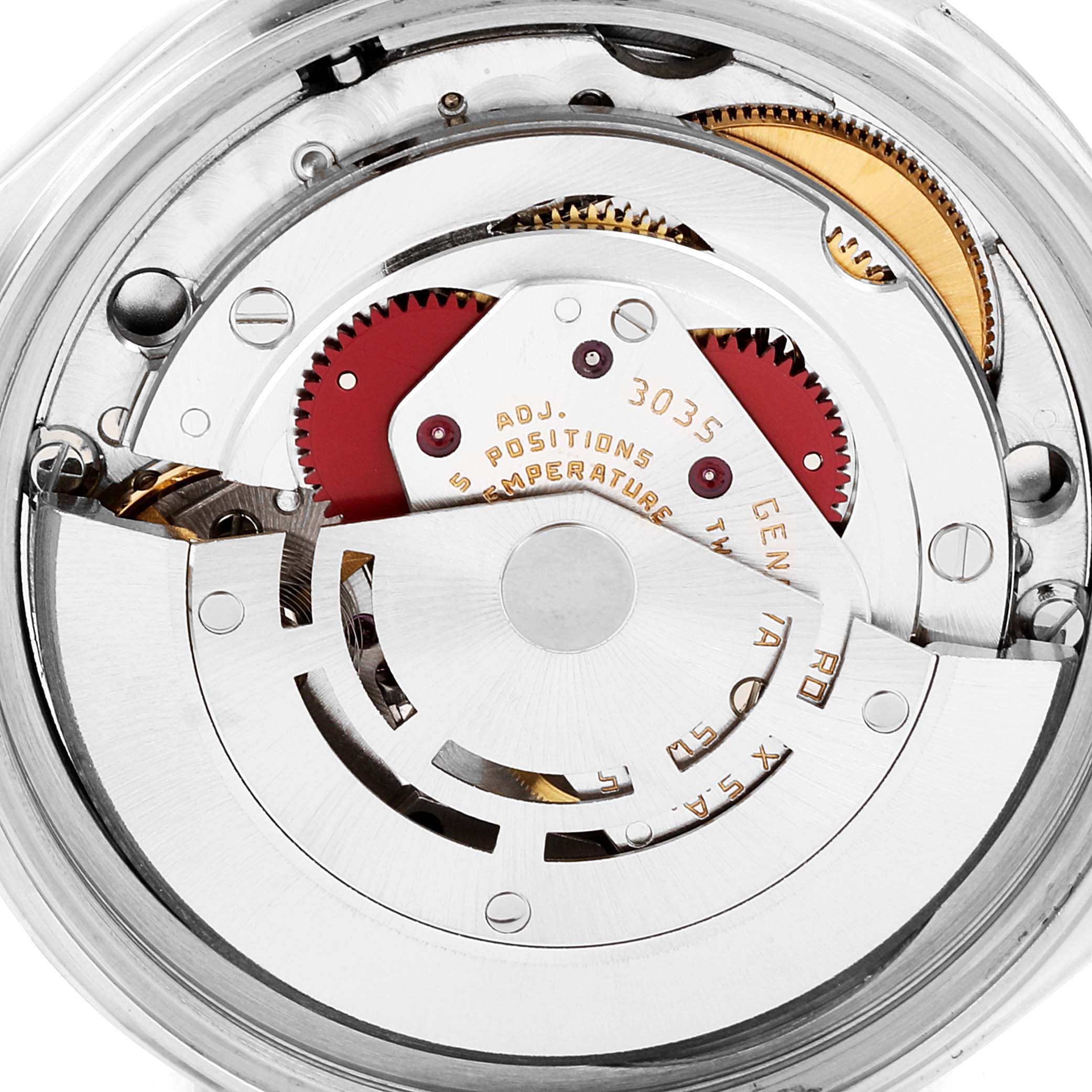 The image shows the internal mechanism and movement components of a Vintage Collection model watch by Rolex from a top-down view.