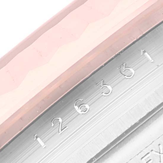 This image shows a close-up of the Rolex Datejust 41 126331 Men's Steel and Gold (two tone) Grey Dial 126331 Men's Steel and Gold (two tone) Grey Dial's rehaut and the edge of its fluted bezel.