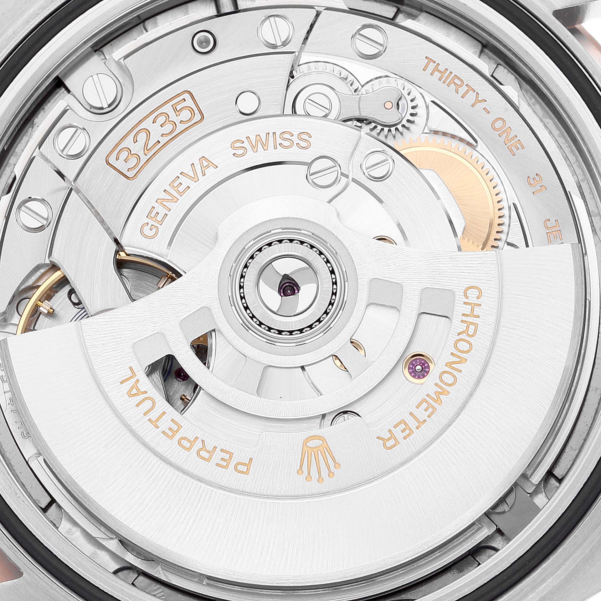This image shows the detailed movement mechanism of a Rolex Datejust 41 126331 Men's Steel and Gold (two tone) Grey Dial 126331 Men's Steel and Gold (two tone) Grey Dial model from a rear angle.