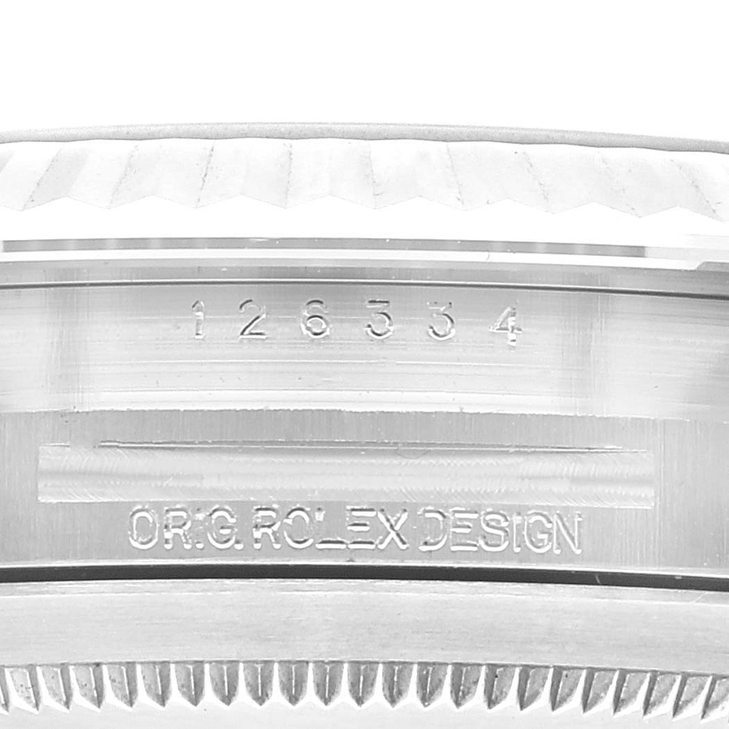 This image shows a close-up of the side edge of the Rolex Datejust 41 126334 Men's Stainless Steel Black Dial 126334 Men's Stainless Steel Black Dial model, featuring its model number and inscription.