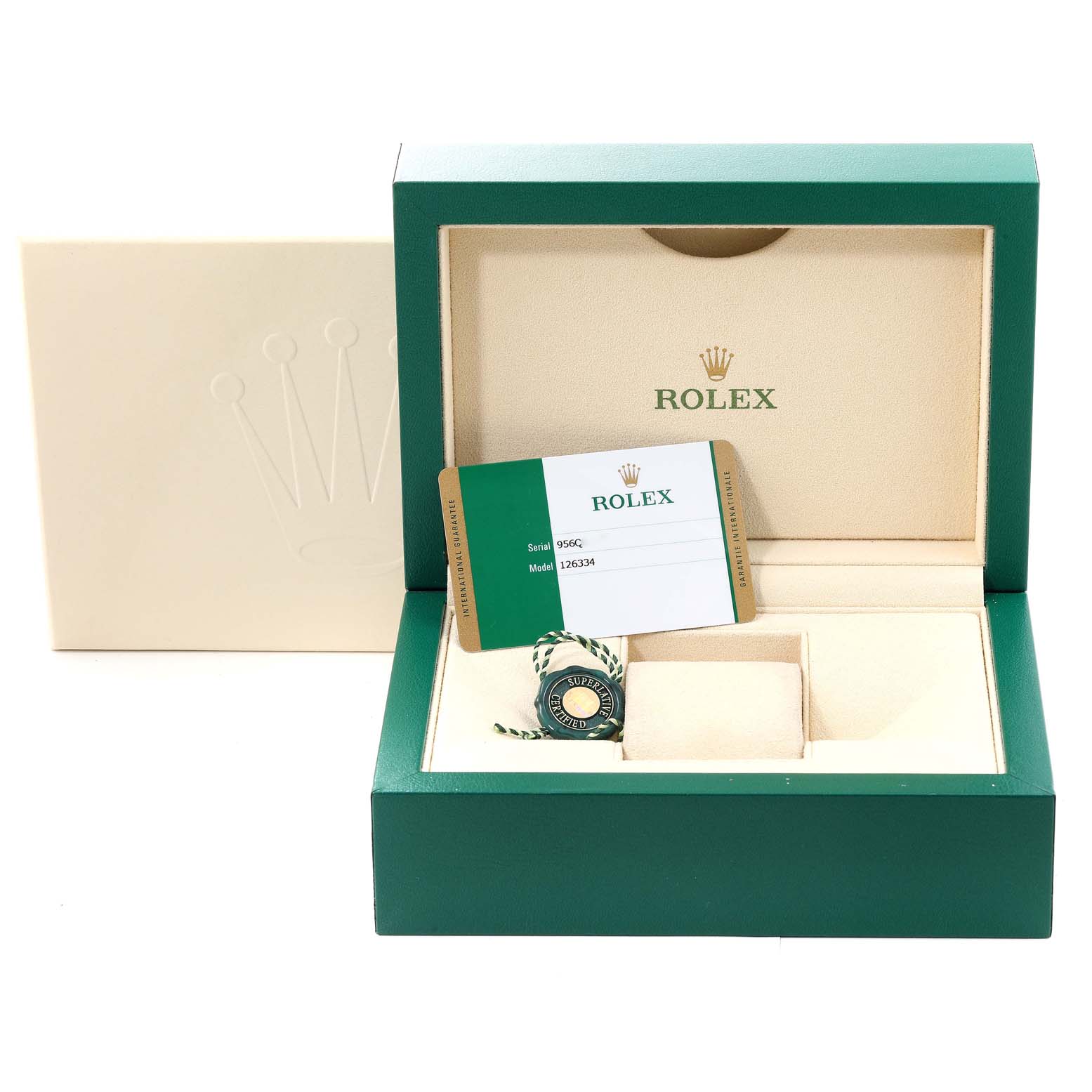 This image shows an open Rolex Datejust 41 126334 Men's Stainless Steel Black Dial 126334 Men's Stainless Steel Black Dial box, including a warranty card and a tag holder.