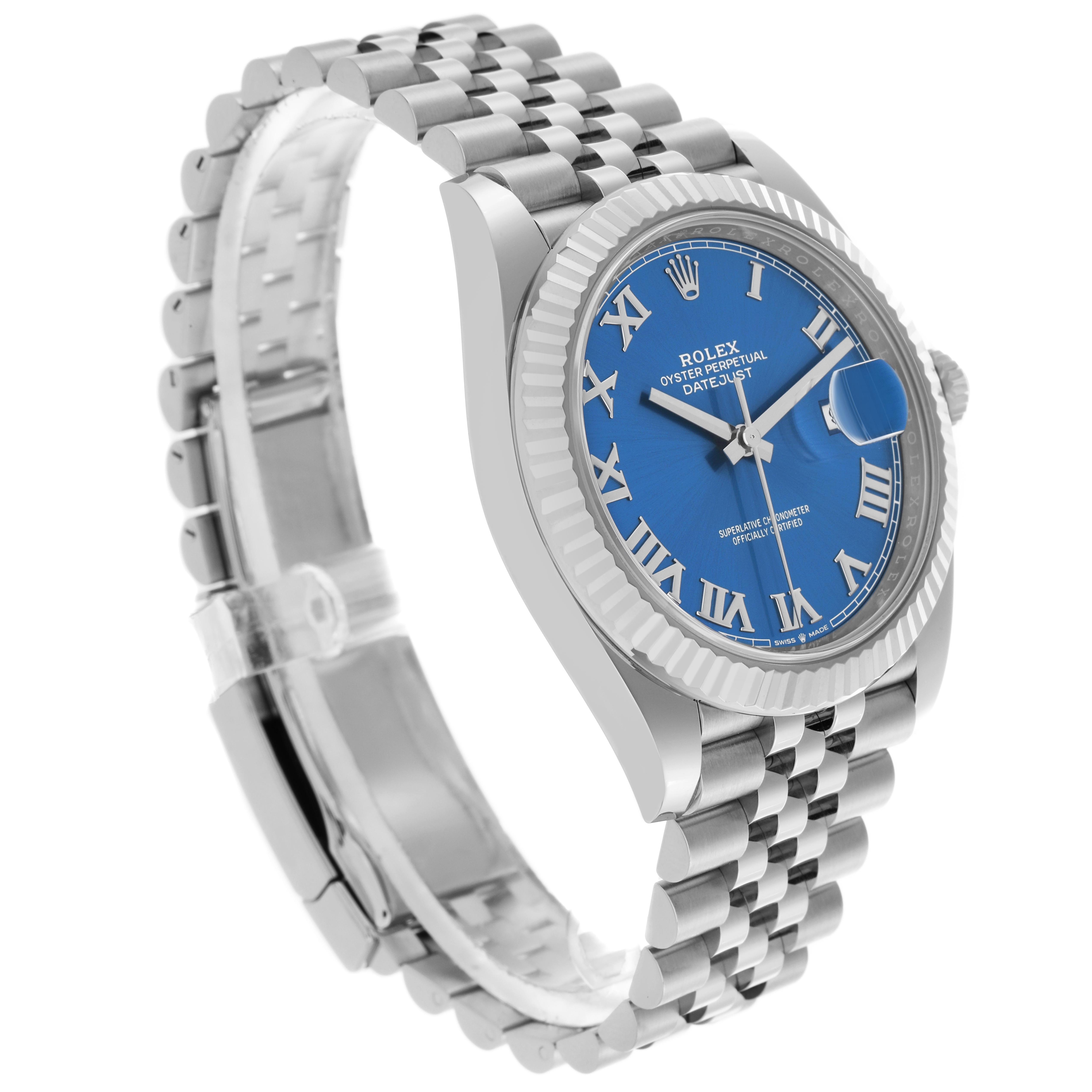 The Rolex Datejust 41 126334 Men
s Stainless Steel Blue Dial 126334 Men
s Stainless Steel Blue Dial is shown at a three-quarter angle, highlighting the blue dial, fluted bezel, and Jubilee bracelet.
