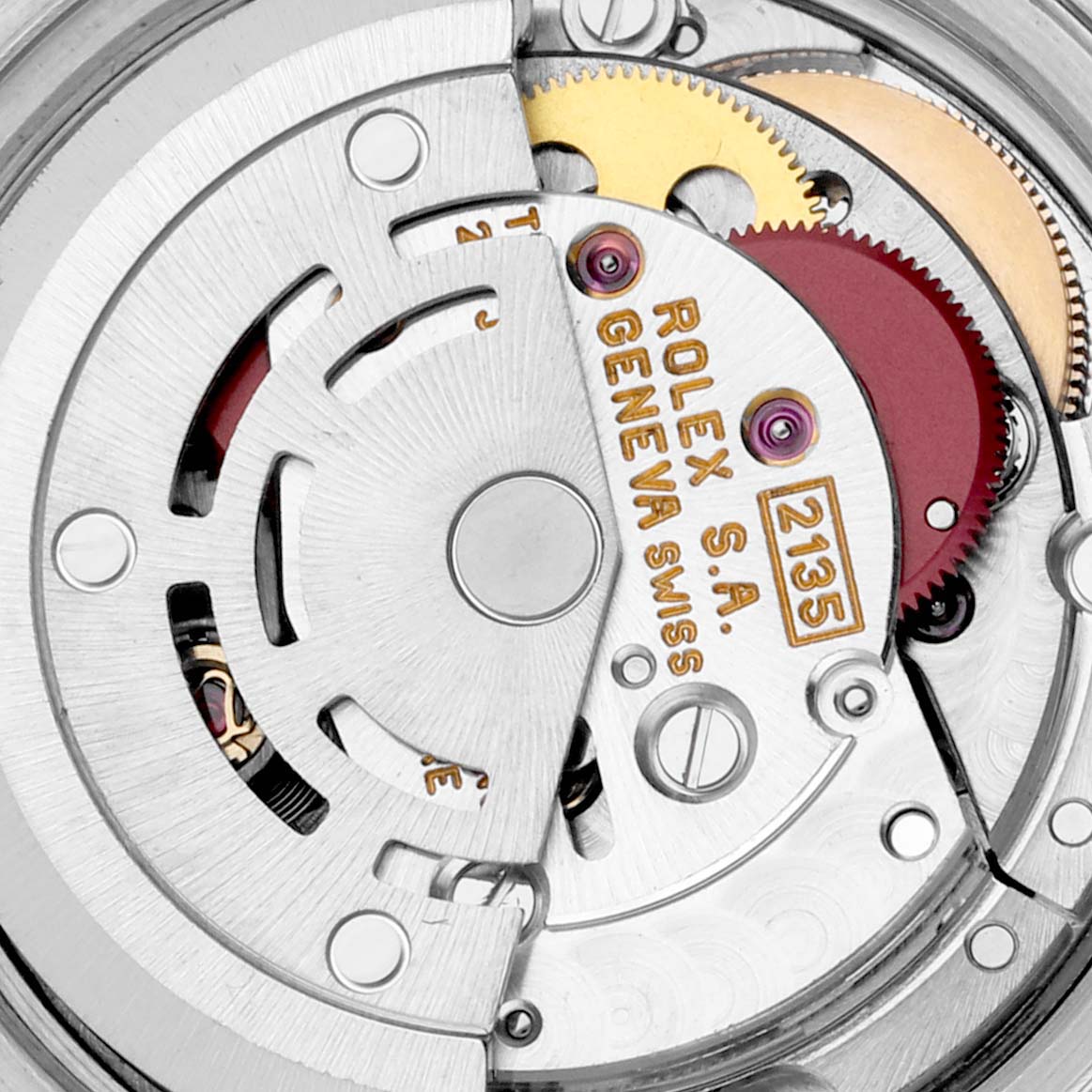 The image shows the internal mechanical movement of a Rolex Datejust 69173 Women's Steel and Gold (two tone) Champagne Dial 69173 Women's Steel and Gold (two tone) Champagne Dial watch, including gears and the rotor.