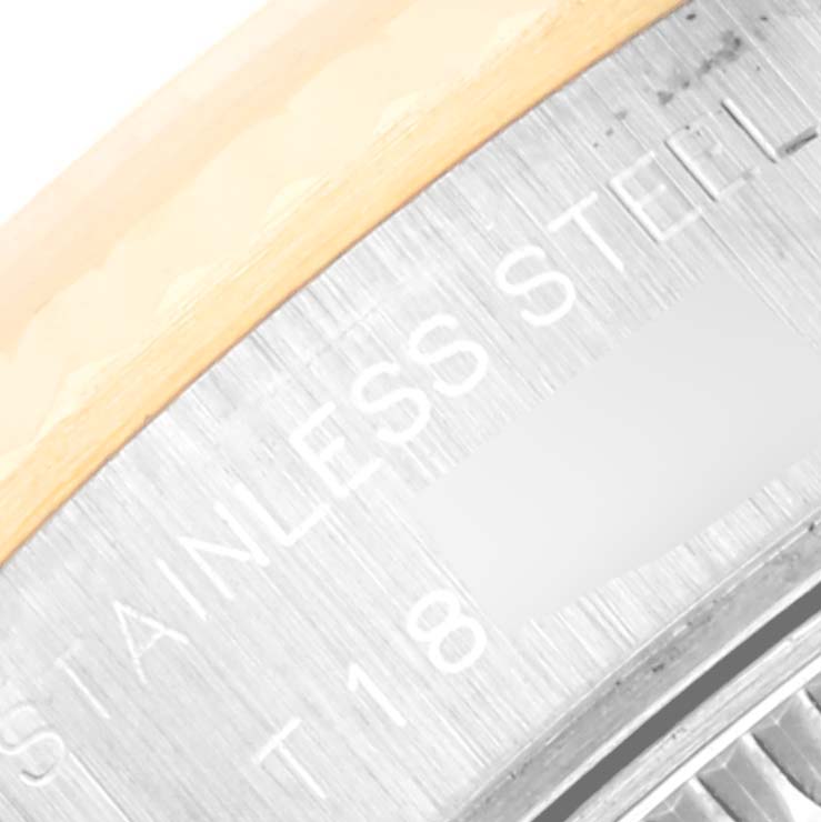 This image shows a close-up of the side view of the stainless steel back case of a Rolex Datejust 69173 Women's Steel and Gold (two tone) Champagne Dial 69173 Women's Steel and Gold (two tone) Champagne Dial watch.