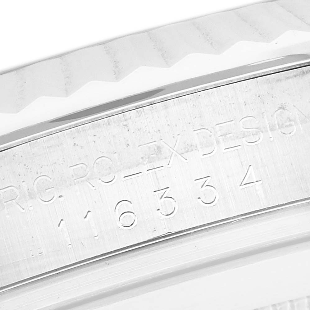 The image shows a close-up of the engraving on the side of the bezel of a Rolex Datejust 41 116334 Men's Stainless Steel Grey Dial 116334 Men's Stainless Steel Grey Dial watch.