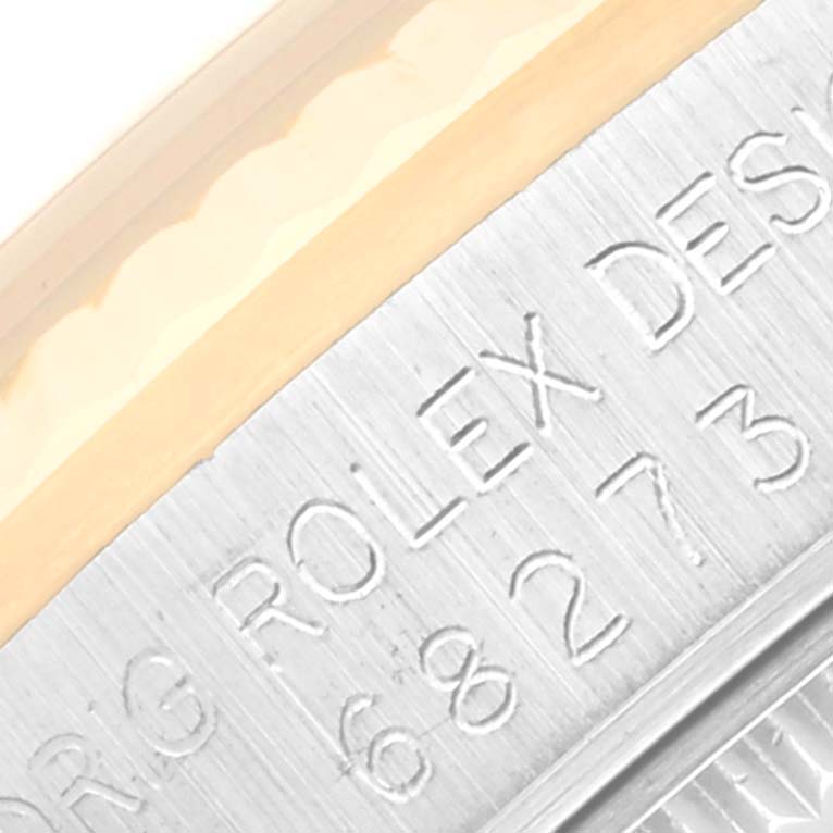 The image shows a close-up of the model number engraving on the side of a mid-size Rolex watch case.