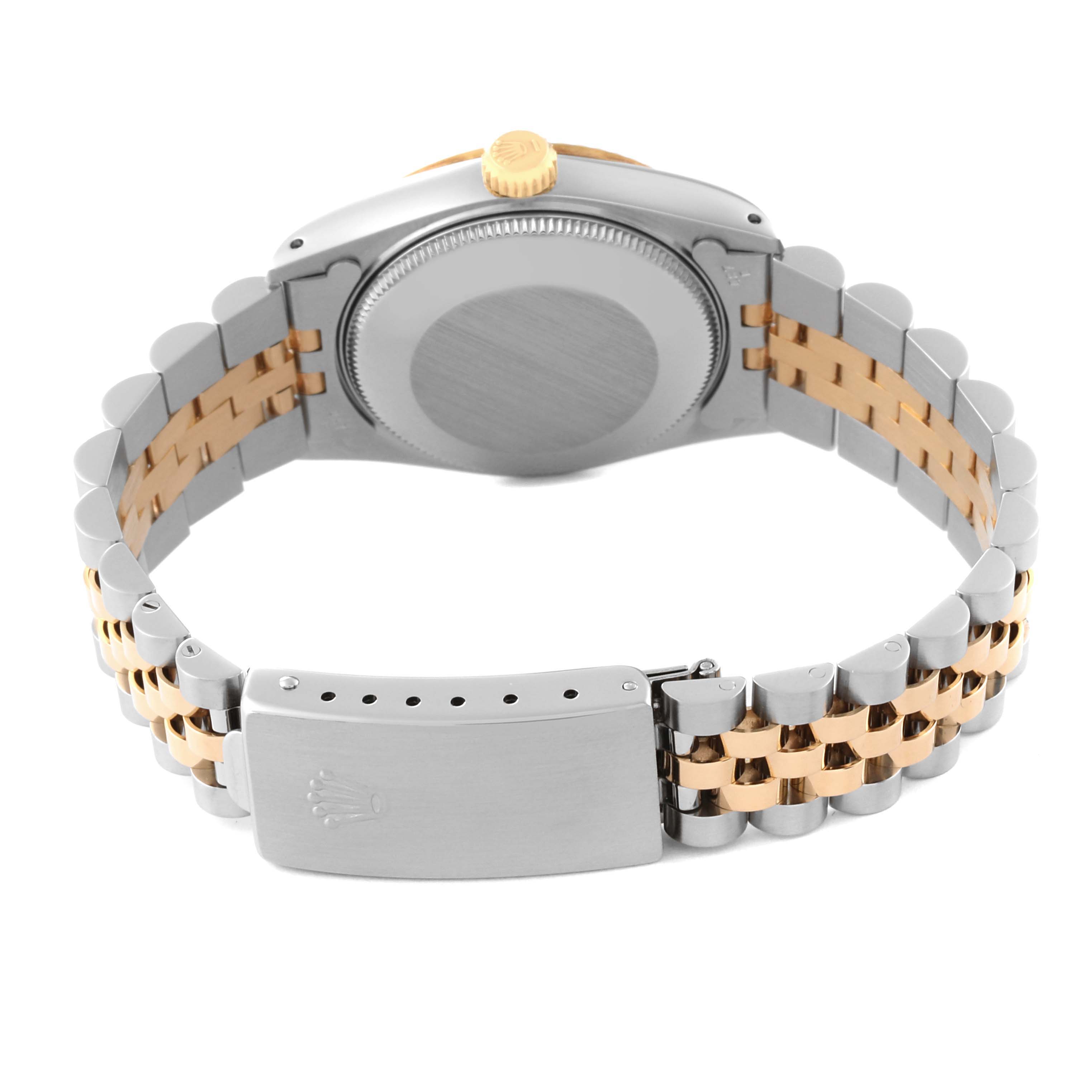 This image shows the back view of a Rolex Mid-Size 68273 Women's Steel and Gold (two tone) Black Dial 68273 Women's Steel and Gold (two tone) Black Dial model, highlighting the case back, crown, and two-tone bracelet with the clasp.