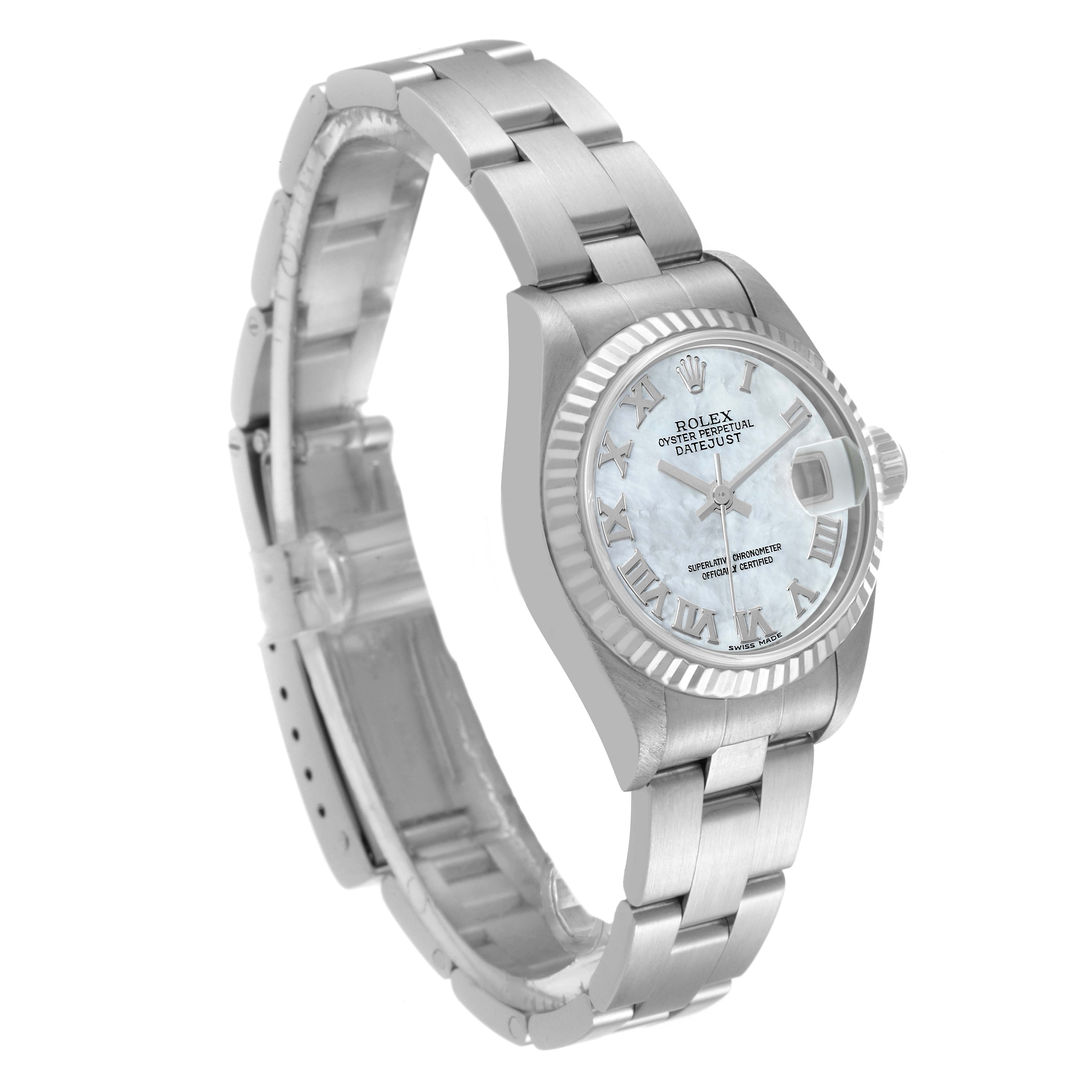 The image shows a side angle view of a Rolex Datejust 79174 Women's Stainless Steel Mother of Pearl Dial 79174 Women's Stainless Steel Mother of Pearl Dial watch's face, bezel, and bracelet.