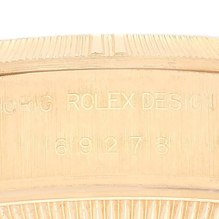 The image shows a close-up of the case back of a Rolex President 69278 Women's Yellow Gold Champagne Dial 69278 Women's Yellow Gold Champagne Dial watch, displaying the engraved model number.