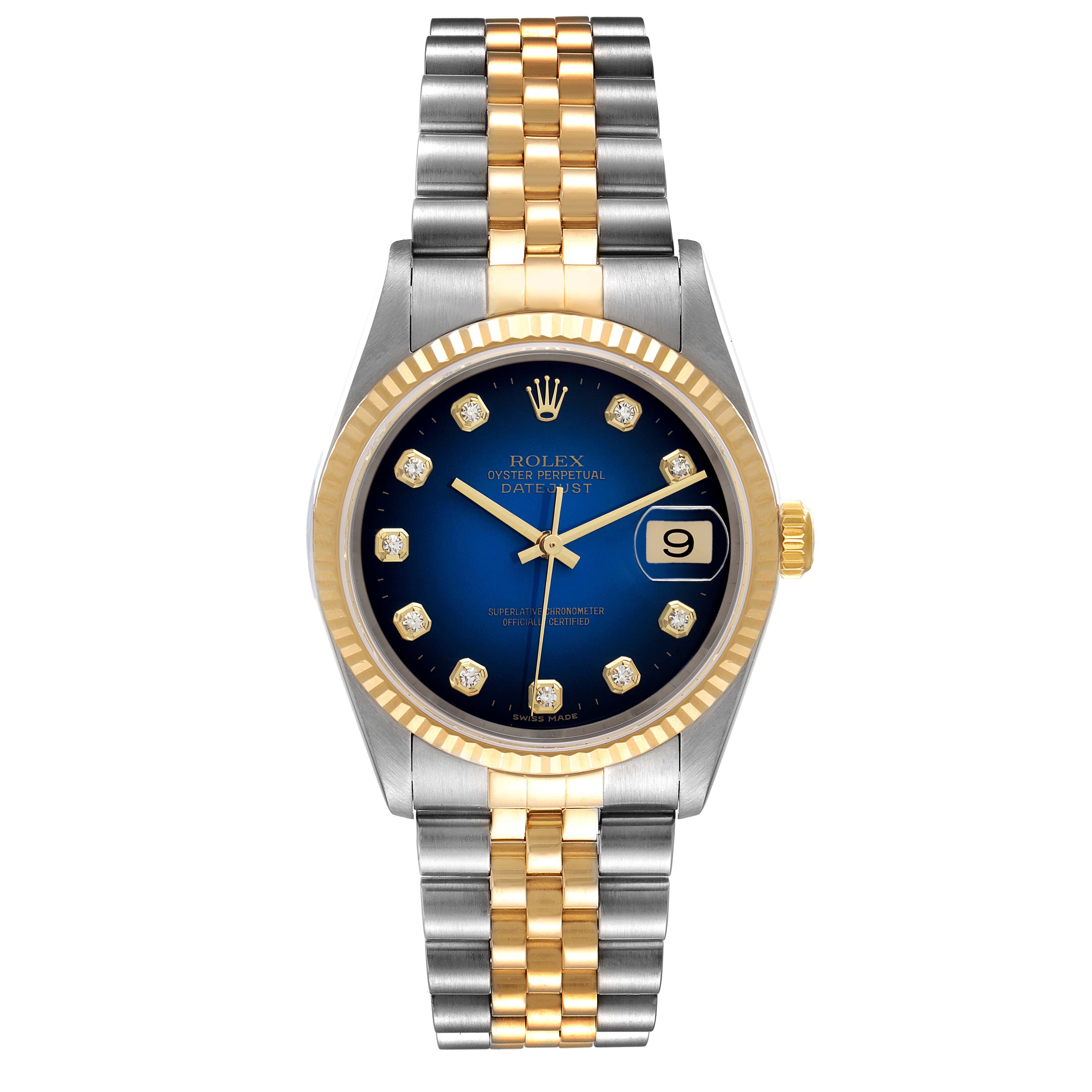 The image shows a Rolex Datejust 16233 Men's Steel and Gold (two tone) Blue Dial 16233 Men's Steel and Gold (two tone) Blue Dial watch from a front angle, highlighting its two-tone bracelet, blue dial, and date window.