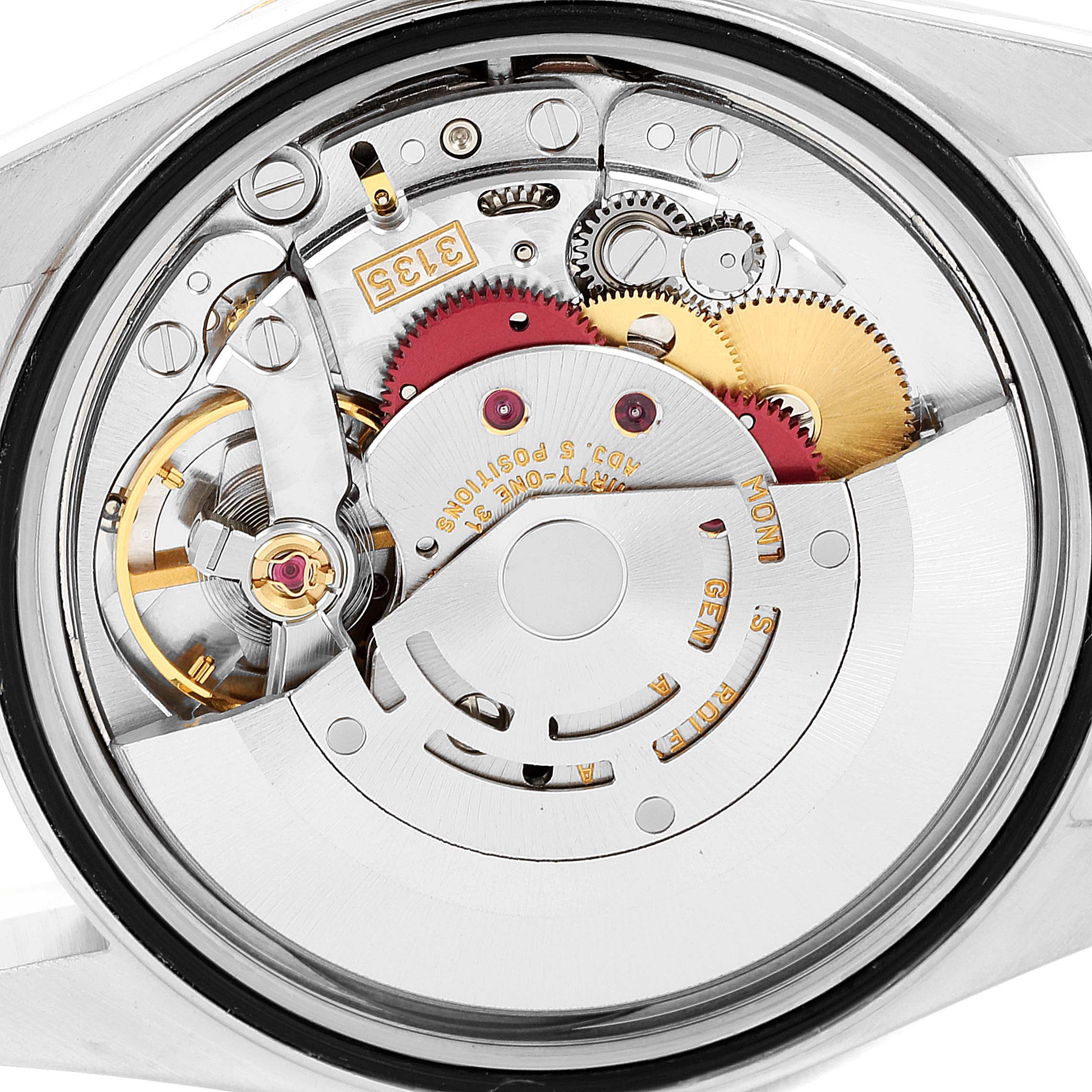 This image shows the movement and internal mechanics of a Rolex Datejust 16233 Men's Steel and Gold (two tone) Blue Dial 16233 Men's Steel and Gold (two tone) Blue Dial watch from a top-down angle.