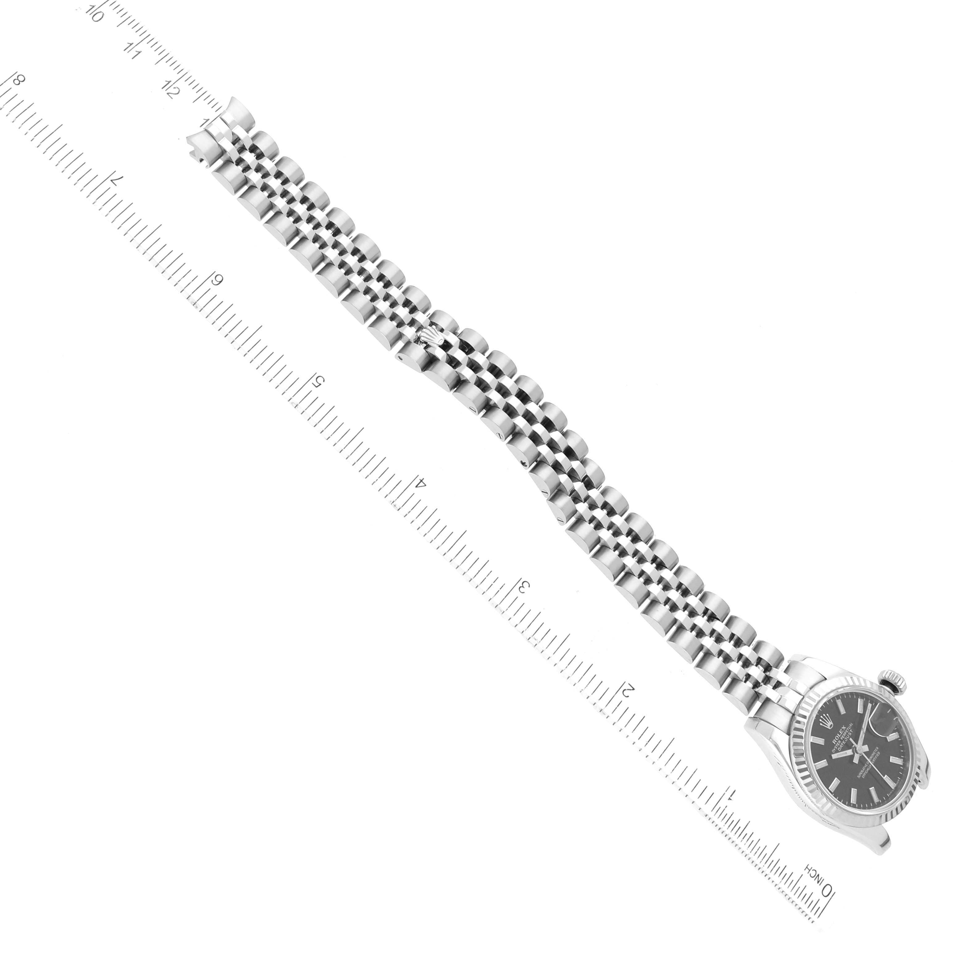 The image shows a Rolex Datejust 179174 Women's Stainless Steel Black Dial 179174 Women's Stainless Steel Black Dial model watch, specifically highlighting the bracelet and watch face from a top-down angle.