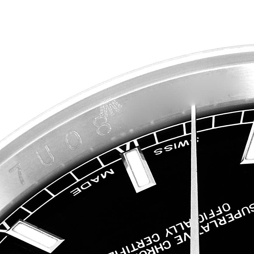 The image shows a close-up of the dial and inner bezel of a Rolex Datejust 116234 Men's Stainless Steel Black Dial 116234 Men's Stainless Steel Black Dial watch, highlighting the brand logo and "Swiss Made" text.