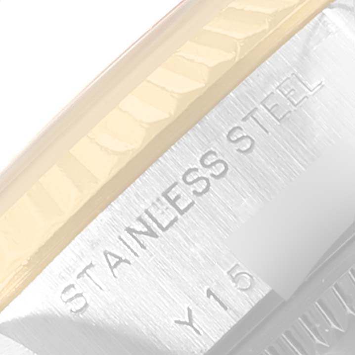 This image shows a close-up of the case side of a Rolex Datejust 69173 Women
s Steel and Gold (two tone) Silver Dial 69173 Women
s Steel and Gold (two tone) Silver Dial watch, highlighting the text "STAINLESS STEEL."