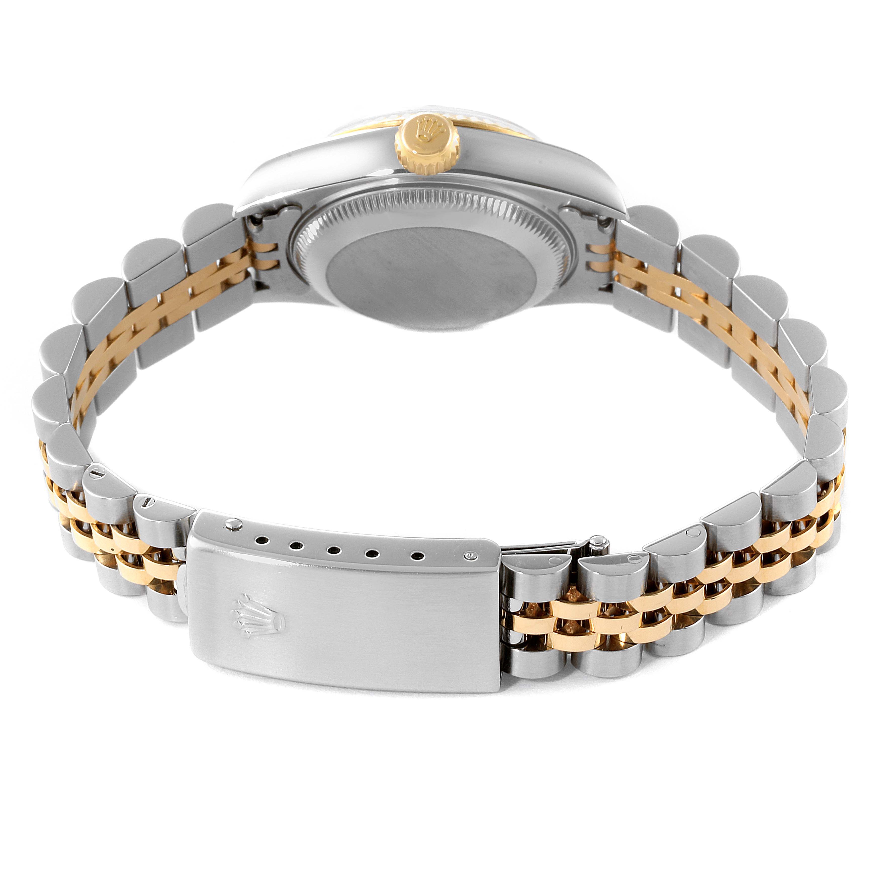 The image shows the back view of a Rolex Datejust 69173 Women
s Steel and Gold (two tone) Silver Dial 69173 Women
s Steel and Gold (two tone) Silver Dial watch, highlighting the case back, crown, and two-tone bracelet with clasp.