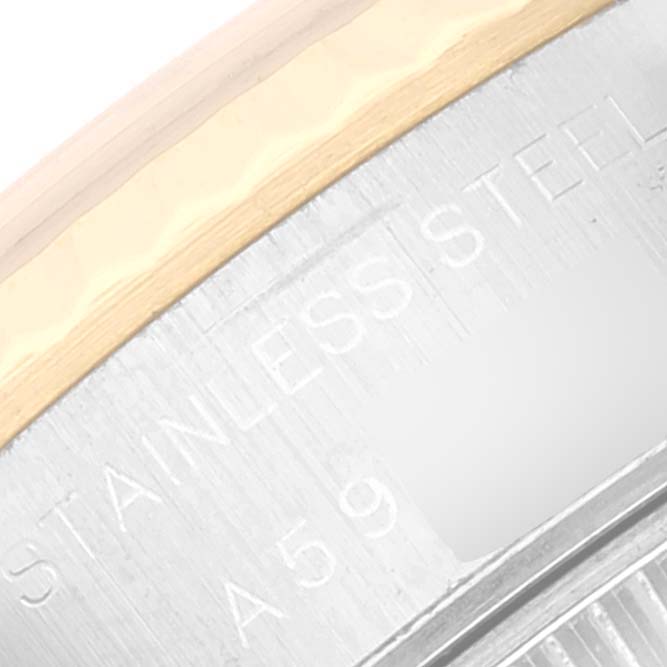 The image shows a close-up angle of the stainless steel case back of a Rolex Datejust 79173 Women's Steel and Gold (two tone) Champagne Dial 79173 Women's Steel and Gold (two tone) Champagne Dial watch, highlighting the "STAINLESS STEEL" engraving.