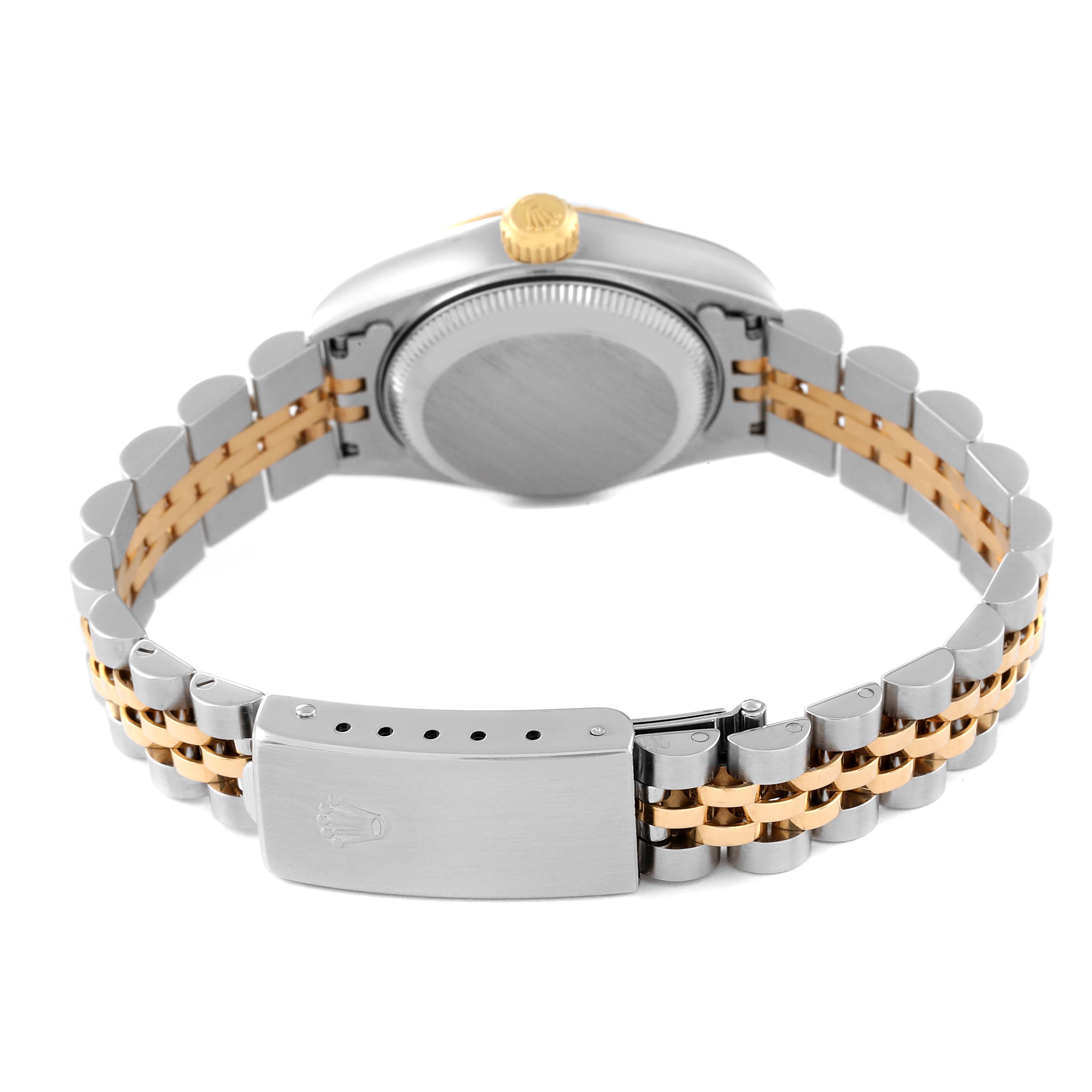 This is a rear view of a Rolex Datejust 79173 Women's Steel and Gold (two tone) Champagne Dial 79173 Women's Steel and Gold (two tone) Champagne Dial watch, showing the case back, crown, and Jubilee bracelet with a clasp.