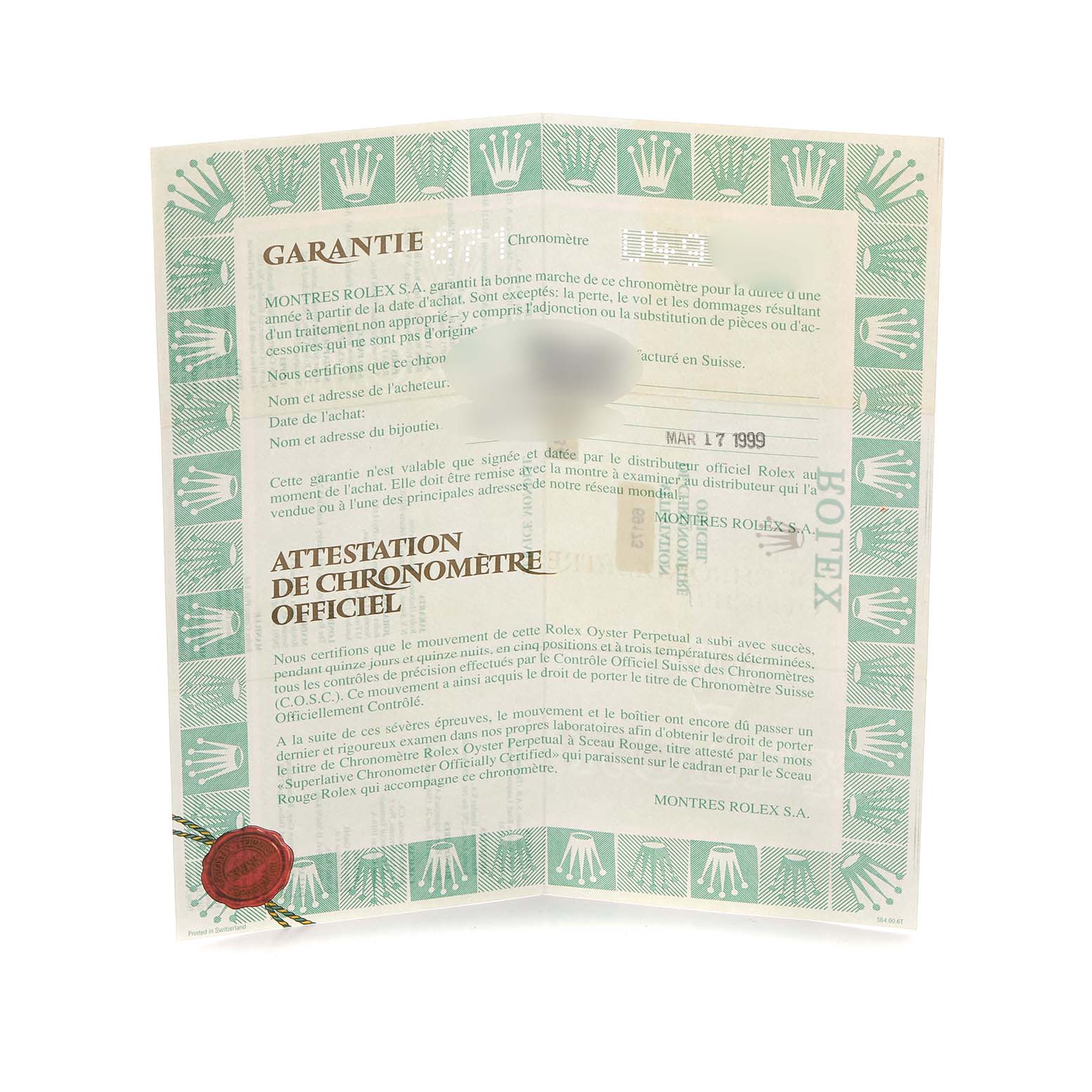 This is a warranty certificate for a Rolex Datejust 69173 Women's Steel and Gold (two tone) Champagne Dial 69173 Women's Steel and Gold (two tone) Champagne Dial, showing text and an official seal with a green border.