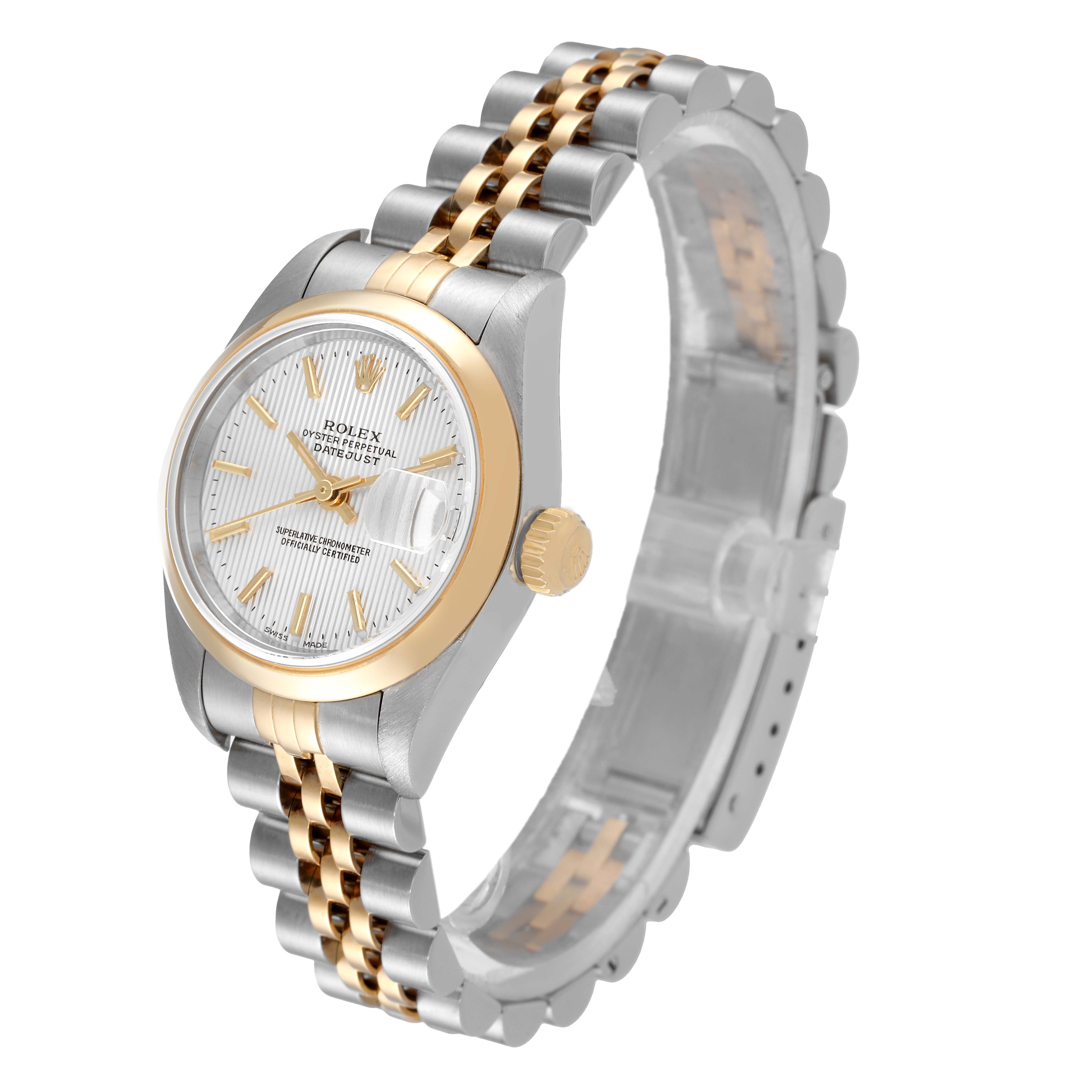 The Rolex Datejust 79163 Women's Steel and Gold (two tone) Silver Dial 79163 Women's Steel and Gold (two tone) Silver Dial watch is shown at an angle highlighting the face, bezel, fluted crown, and two-tone Jubilee bracelet.