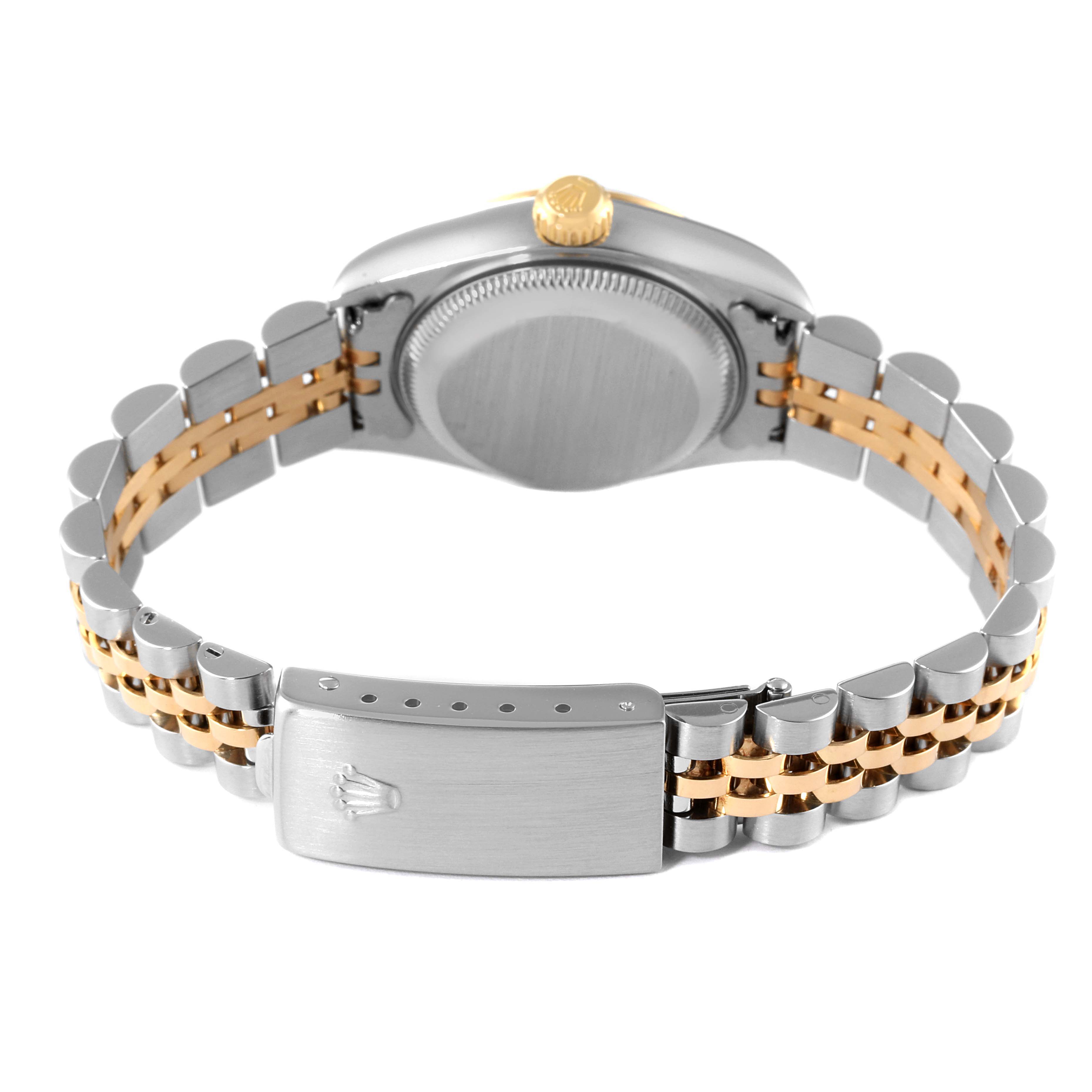This is a rear view of a Rolex Datejust 79163 Women's Steel and Gold (two tone) Silver Dial 79163 Women's Steel and Gold (two tone) Silver Dial model, showing the back case and two-tone metal bracelet with the clasp visible.