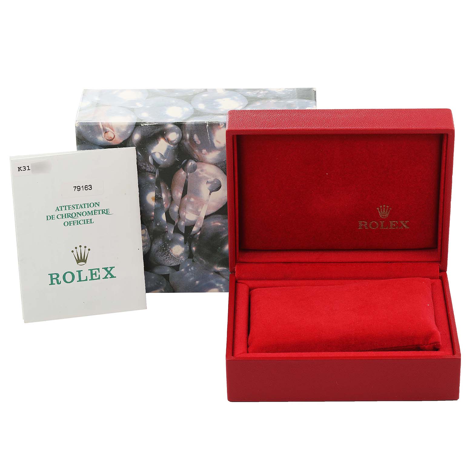 The image shows a Rolex Datejust 79163 Women's Steel and Gold (two tone) Silver Dial 79163 Women's Steel and Gold (two tone) Silver Dial watch box, certificate booklet, and outer packaging from a front angle.
