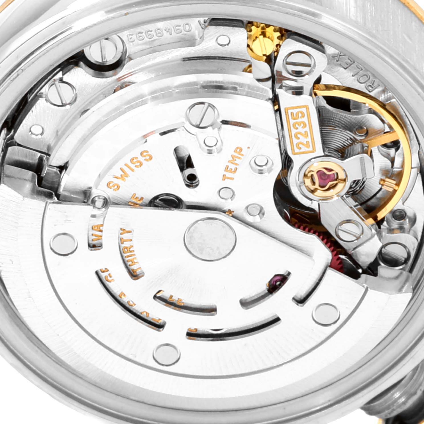 This image shows the intricate movement mechanism of the Rolex Datejust 79163 Women's Steel and Gold (two tone) Silver Dial 79163 Women's Steel and Gold (two tone) Silver Dial watch from a detailed, close-up angle.