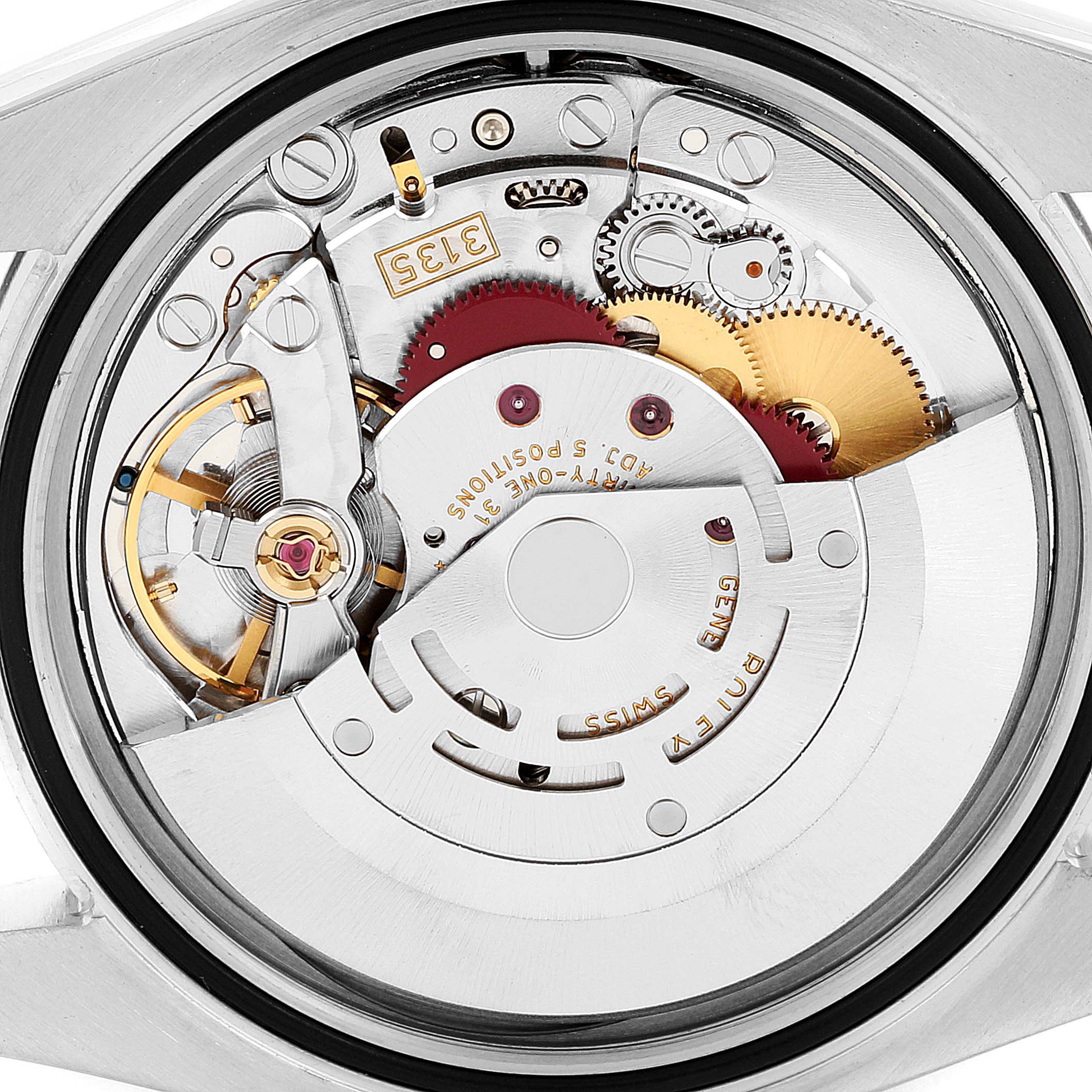 This image shows the internal movement mechanism of a Rolex Datejust 116233 Men's Steel and Gold (two tone) Silver Dial 116233 Men's Steel and Gold (two tone) Silver Dial watch from a close-up angle.