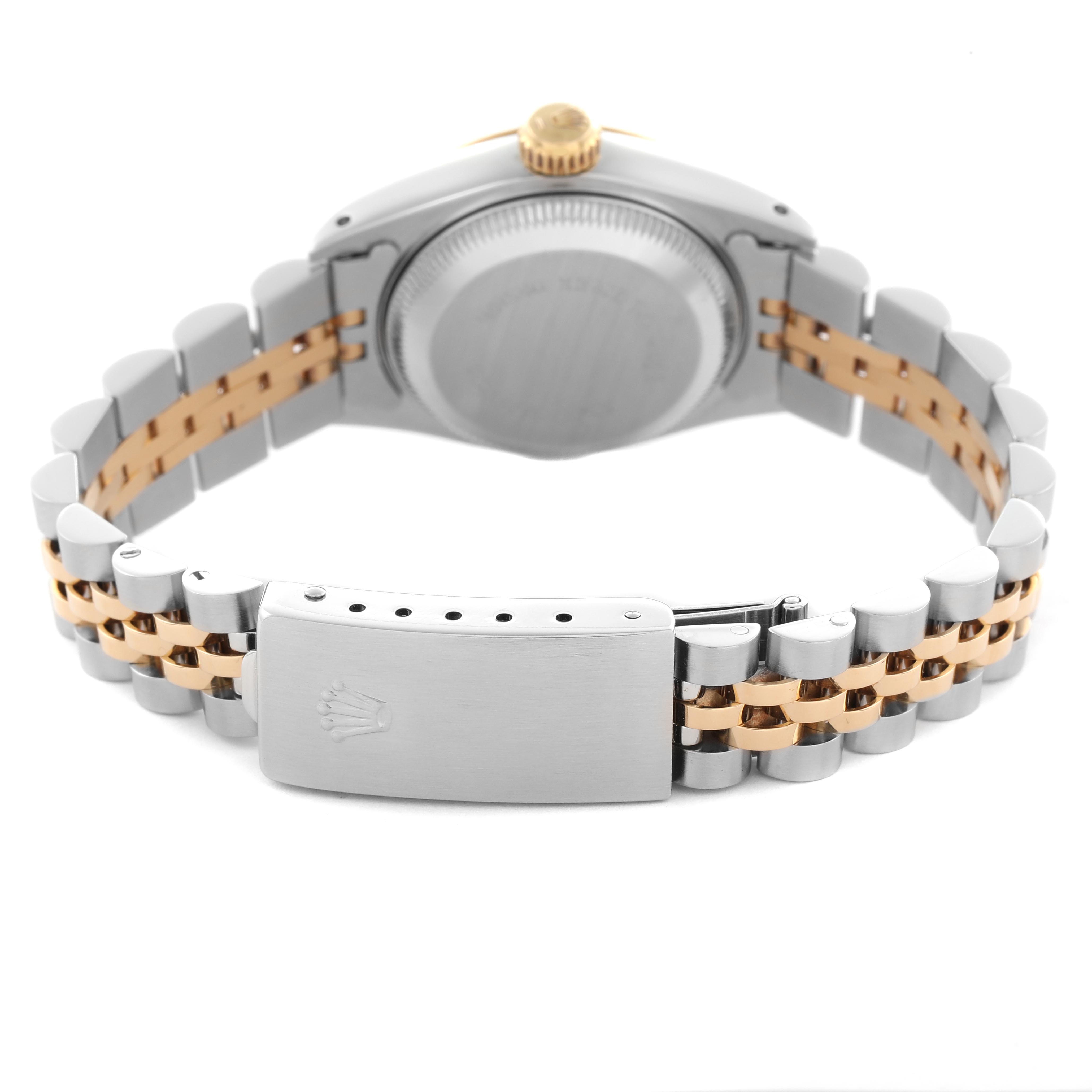 The image shows the back of a Rolex Datejust 69173 Women
s Steel and Gold (two tone) White Dial 69173 Women
s Steel and Gold (two tone) White Dial watch with its Jubilee bracelet and clasp visible.