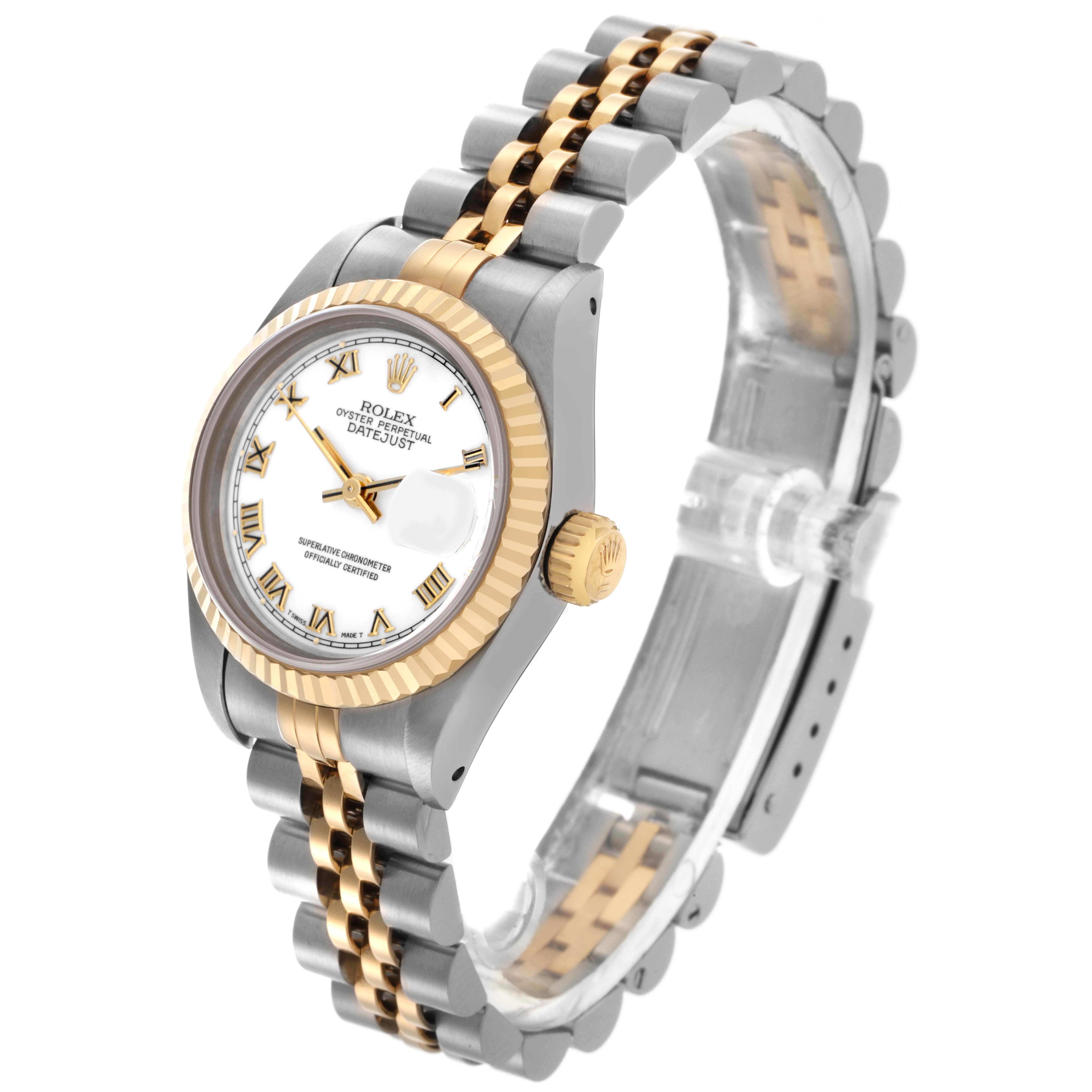 The Rolex Datejust 69173 Women
s Steel and Gold (two tone) White Dial 69173 Women
s Steel and Gold (two tone) White Dial watch is shown at an angled side view, highlighting the bezel, dial, crown, and part of the bracelet.