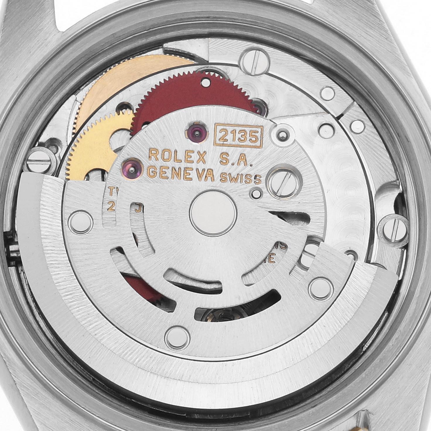 The image shows the movement of a Rolex Datejust 69173 Women
s Steel and Gold (two tone) White Dial 69173 Women
s Steel and Gold (two tone) White Dial watch, viewed from the back, highlighting gears and the rotor.