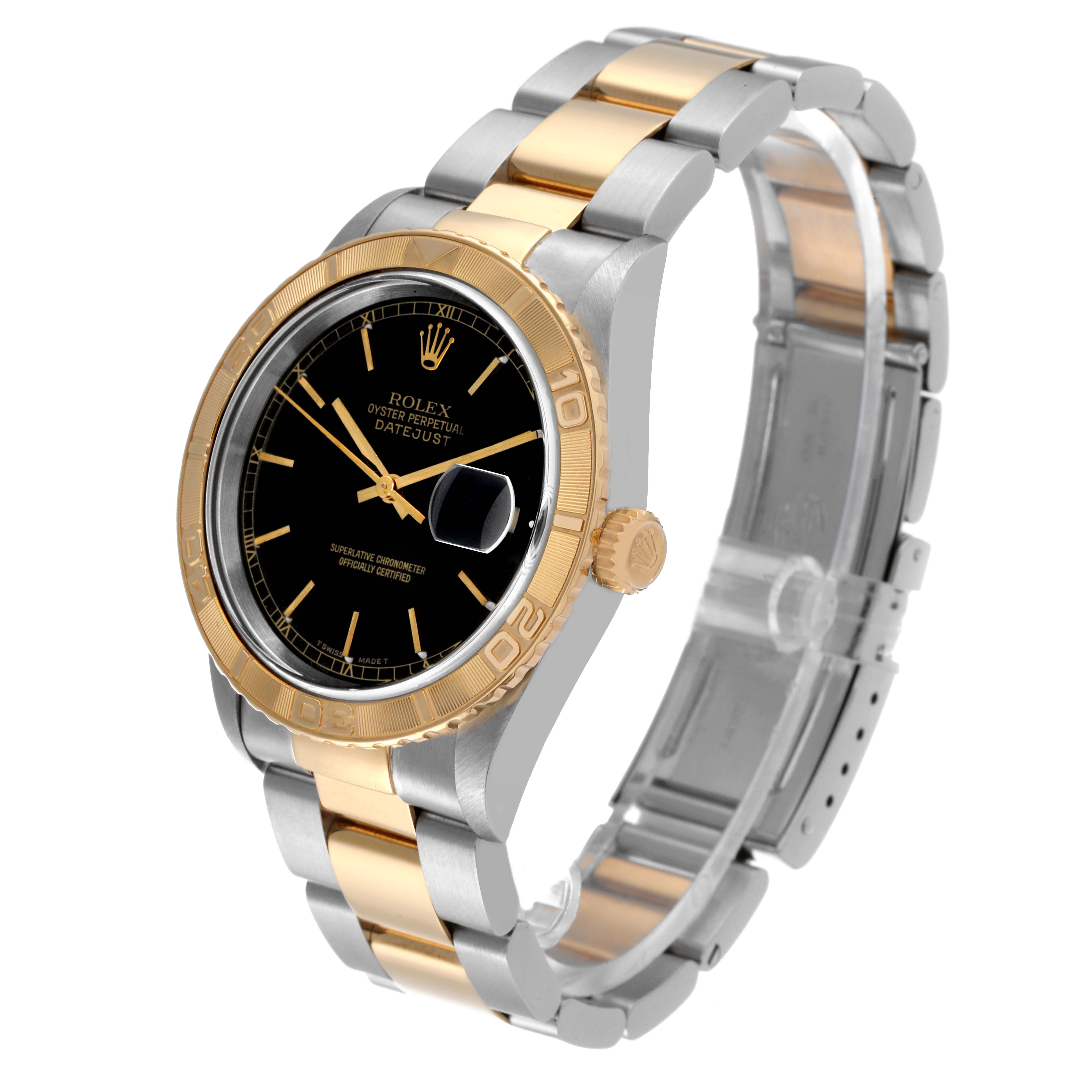The image shows a Rolex Turn-o-Graph 16263 Men
s Steel and Gold (two tone) Black Dial 16263 Men
s Steel and Gold (two tone) Black Dial watch at a slight angle, displaying its black dial, gold bezel, and two-tone metal bracelet.