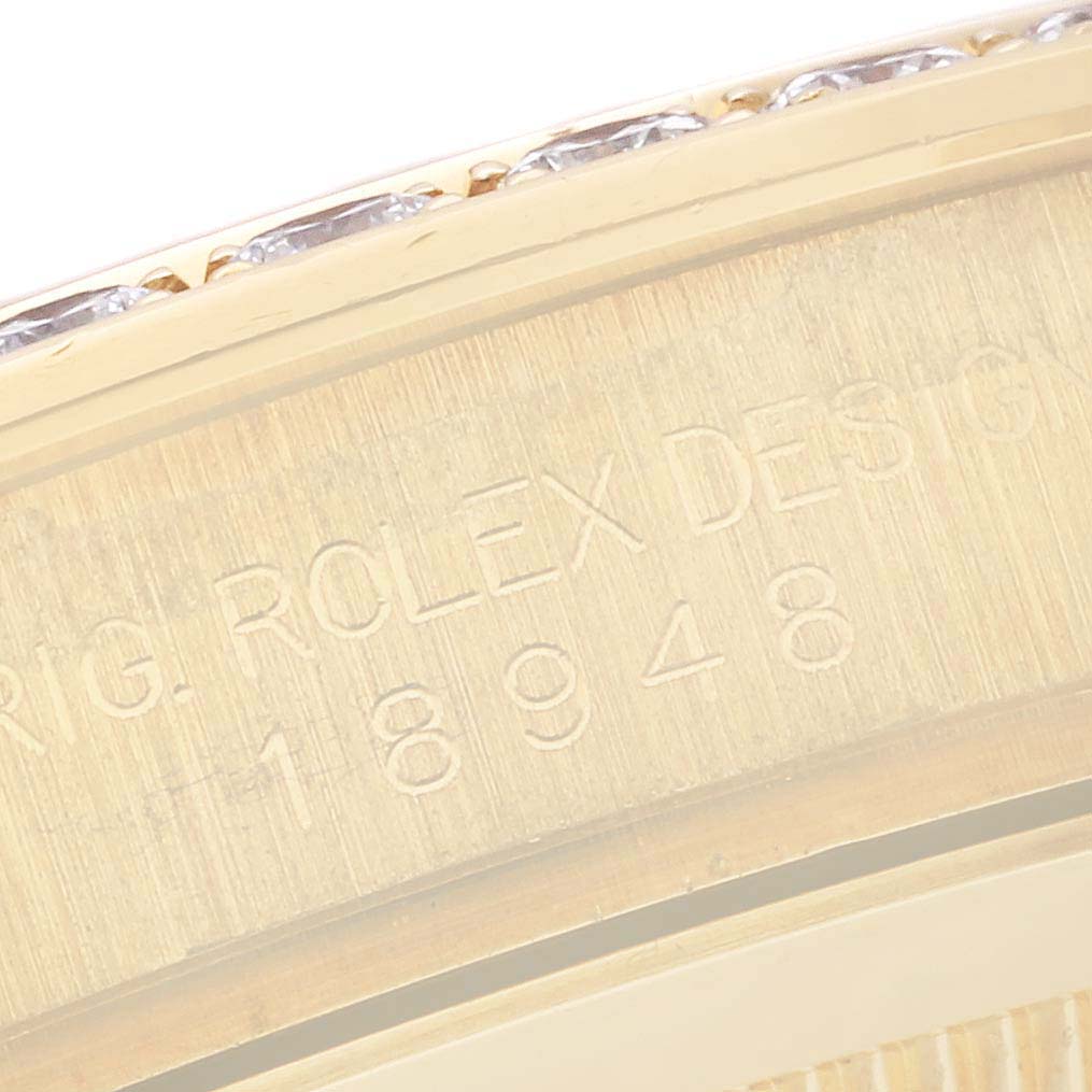 The image shows a close-up of the inner bezel and engraved serial number of a Rolex Pearlmaster 18948 Men's Yellow Gold Mother of Pearl Dial 18948 Men's Yellow Gold Mother of Pearl Dial watch.