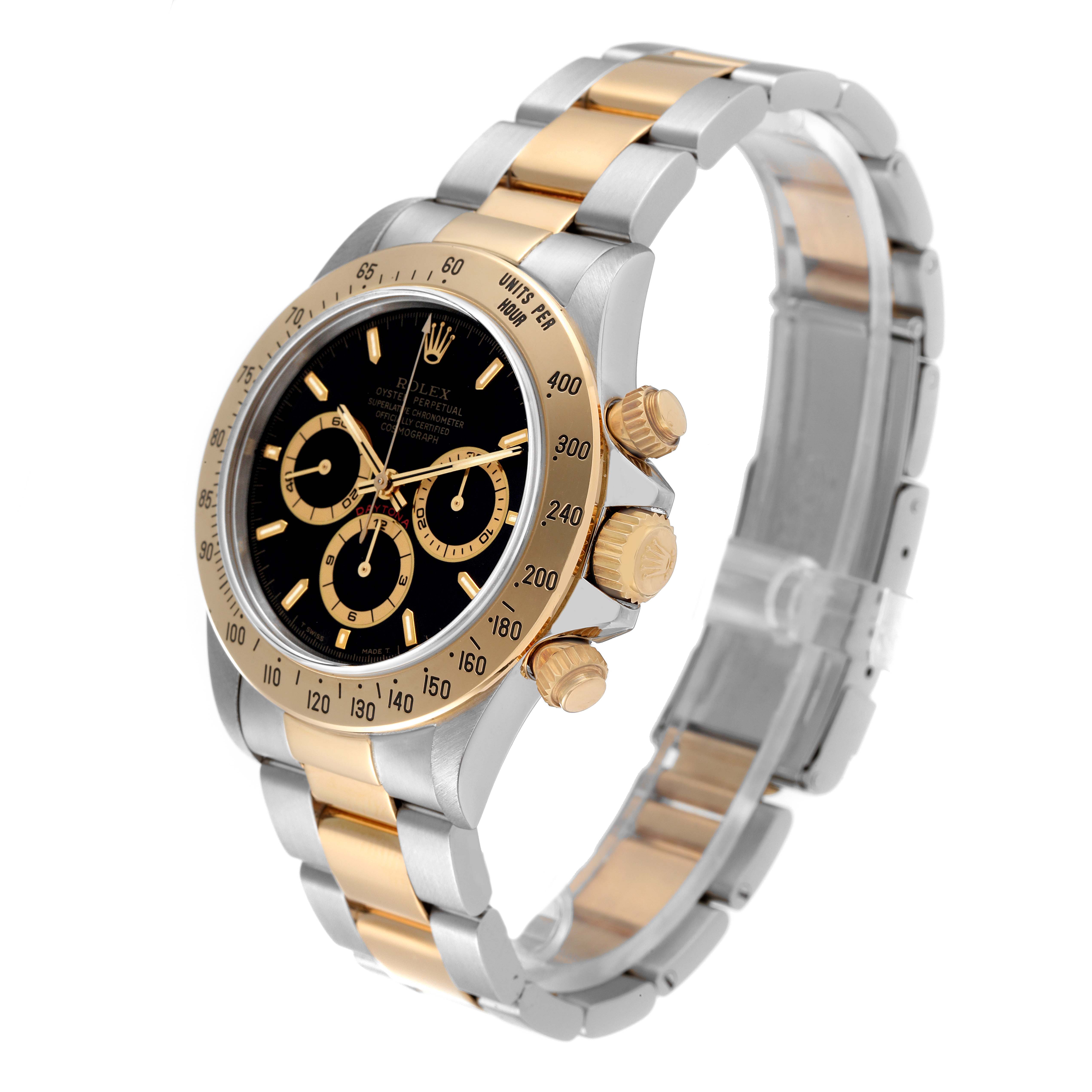The Rolex Daytona 16523 Men's Steel and Gold (two tone) Black Dial 16523 Men's Steel and Gold (two tone) Black Dial watch is shown at a three-quarter angle, highlighting the dial, bezel, and bracelet links.