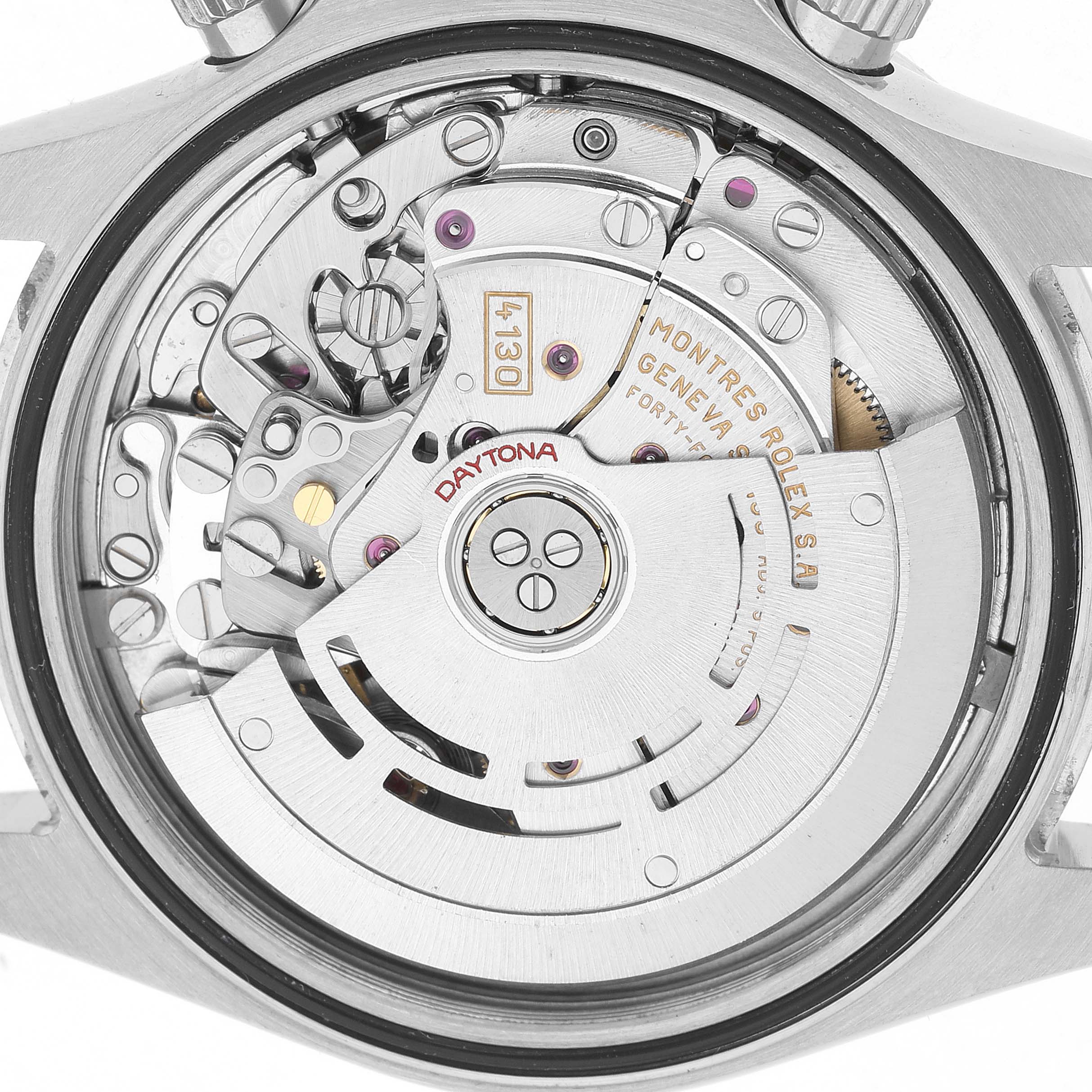 The image shows the Rolex Daytona 116520 Men's Stainless Steel White Dial watch movement from a top-down angle, highlighting its intricate mechanisms.