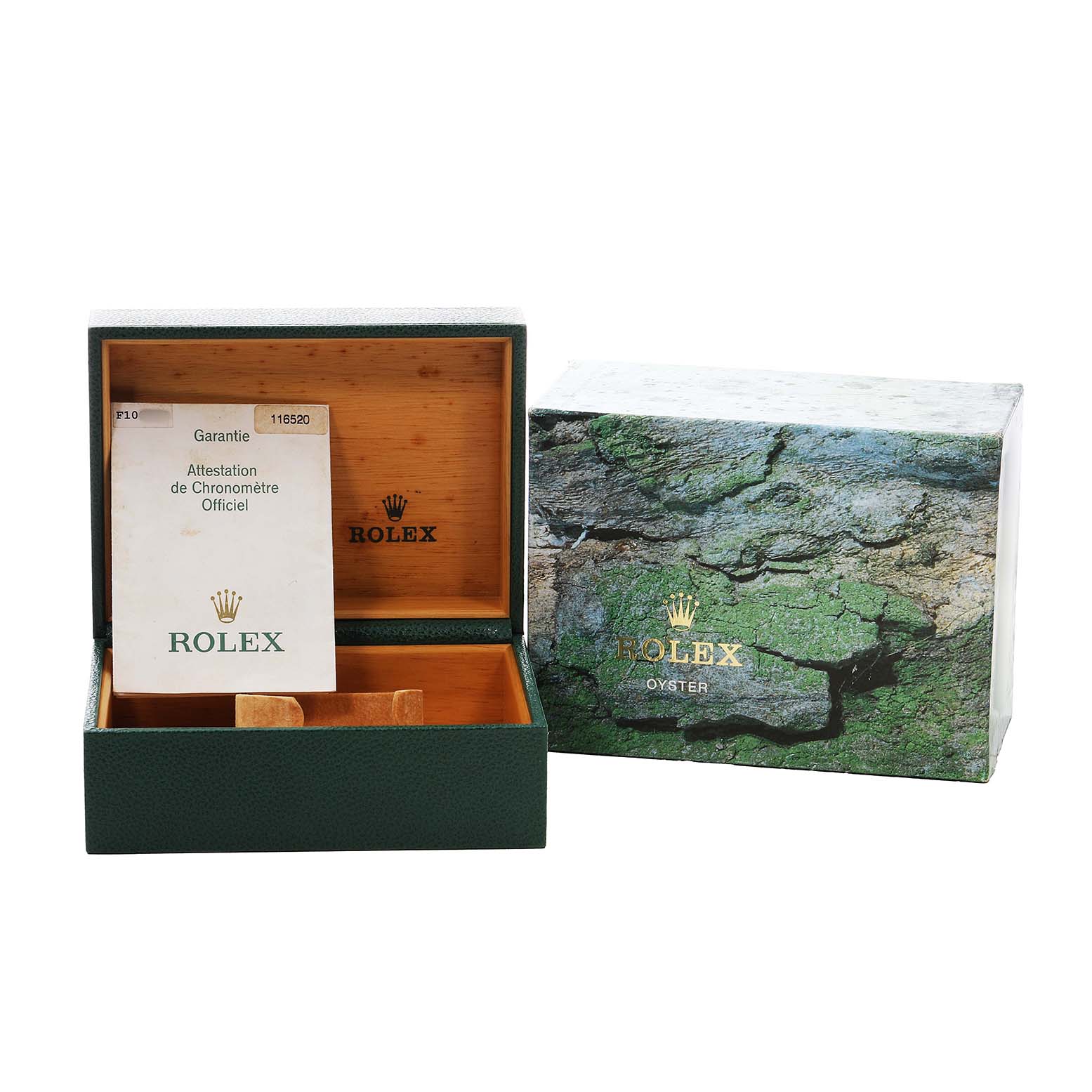 The image shows a Rolex Daytona 116520 Men's Stainless Steel White Dial box, an open green box with a certificate inside, and an outer decorative sleeve.