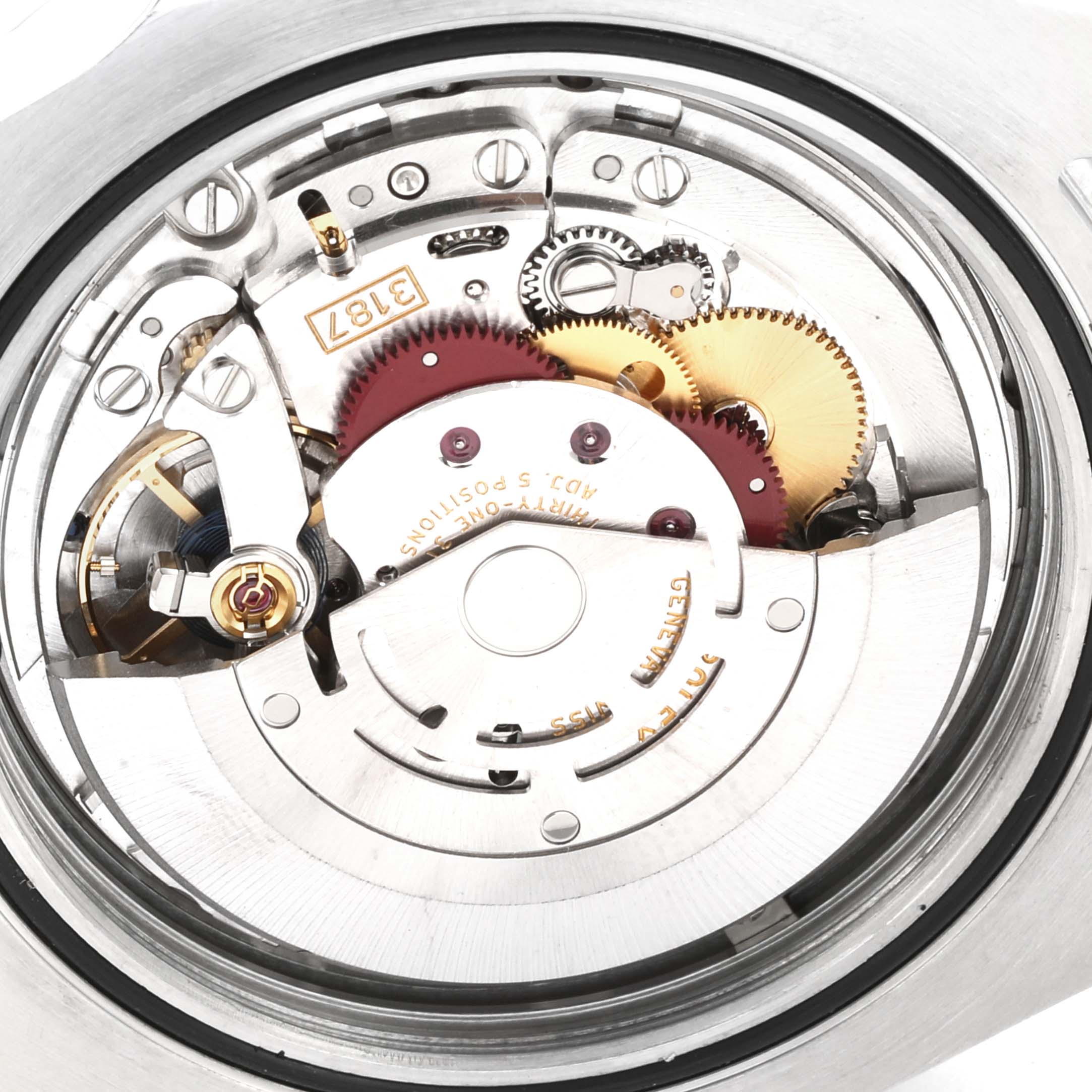 The image shows a close-up view of the inner movement mechanism of a Rolex Explorer 216570 Men's Stainless Steel Black Dial 216570 Men's Stainless Steel Black Dial watch.