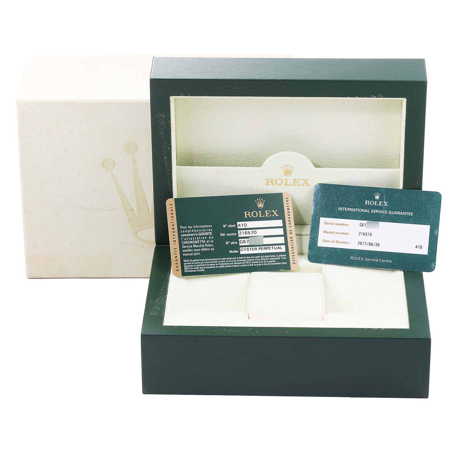 The image shows the box and certification cards for the Rolex Explorer 216570 Men's Stainless Steel Black Dial 216570 Men's Stainless Steel Black Dial model.