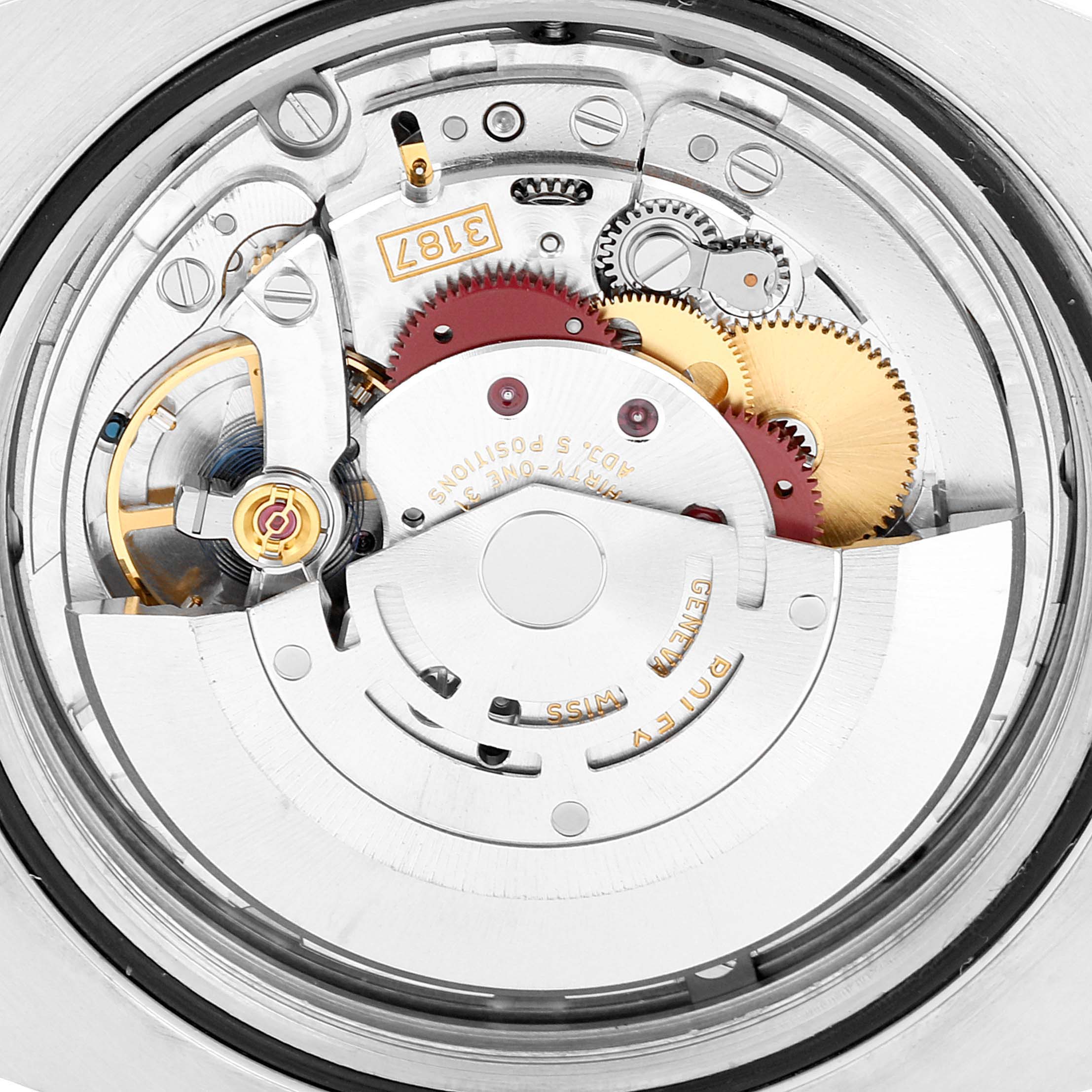 This image shows a close-up of the Rolex Explorer 216570 Men's Stainless Steel Black Dial 216570 Men's Stainless Steel Black Dial's watch movement and inner mechanism from the back.