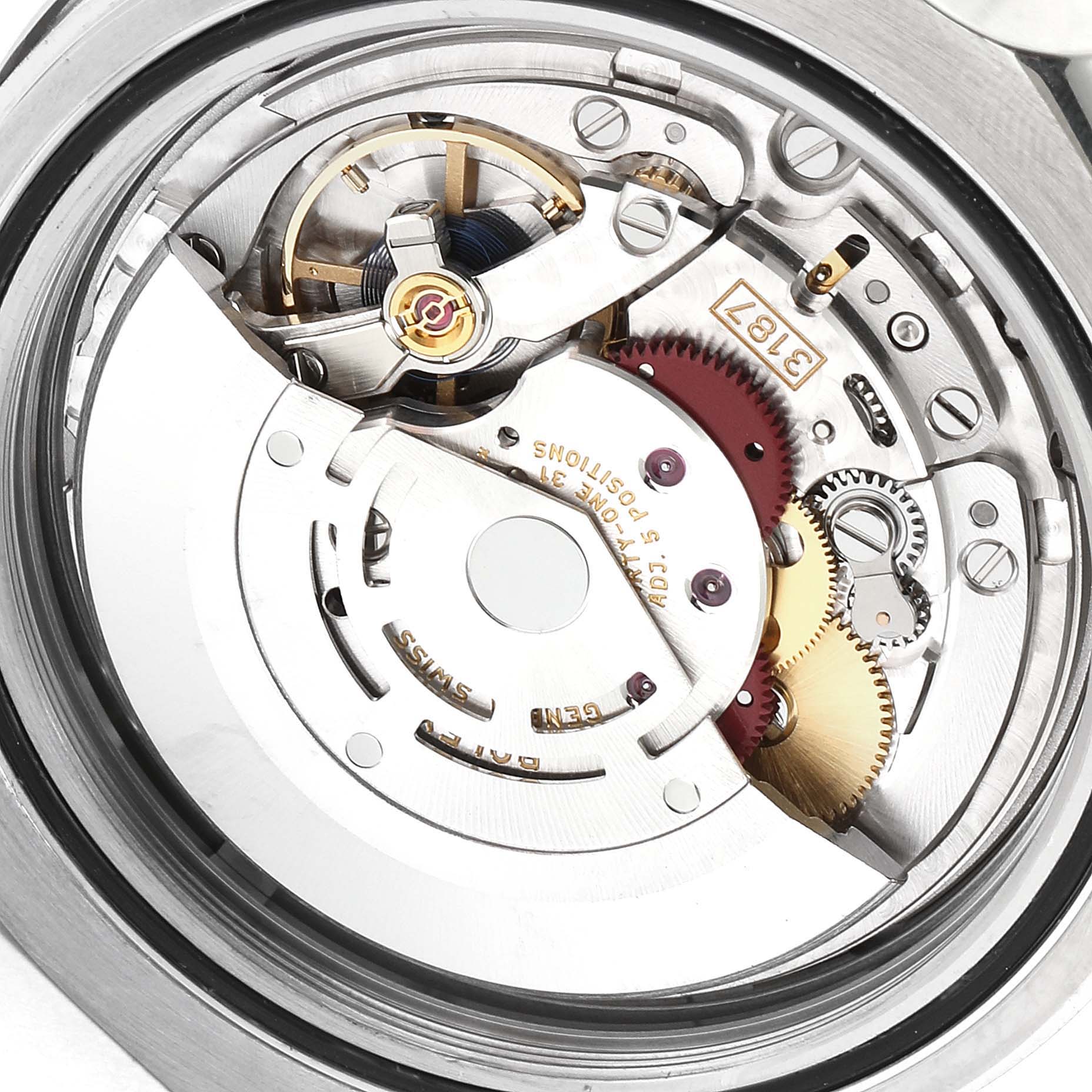 The image shows a close-up view of the movement mechanism of a Rolex Explorer 216570 Men's Stainless Steel White Dial 216570 Men's Stainless Steel White Dial watch, highlighting the intricate internal components.