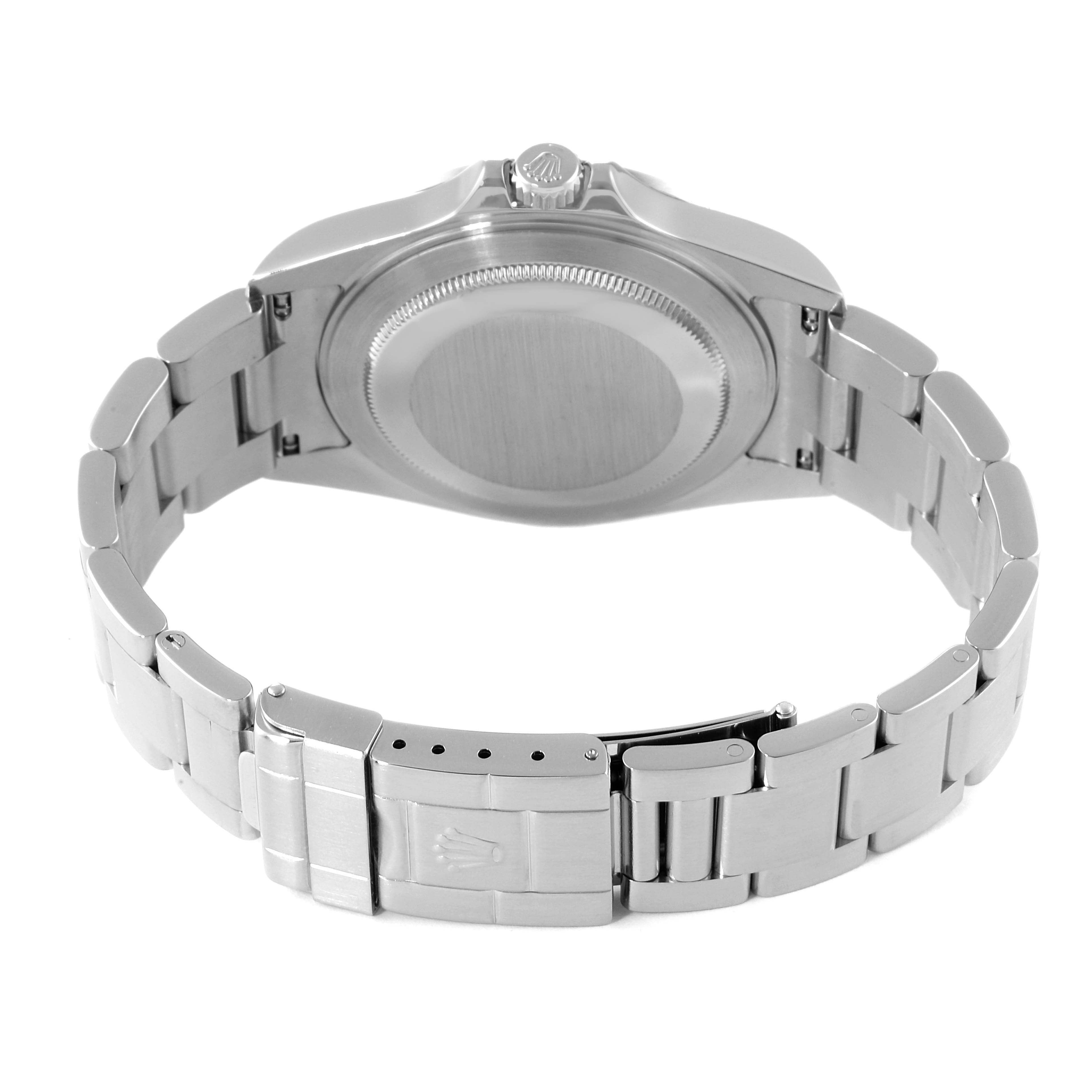 The image shows the back view of a Rolex Explorer 16570 Men
s Stainless Steel Black Dial 16570 Men
s Stainless Steel Black Dial watch, highlighting its case back and stainless steel bracelet with the clasp.