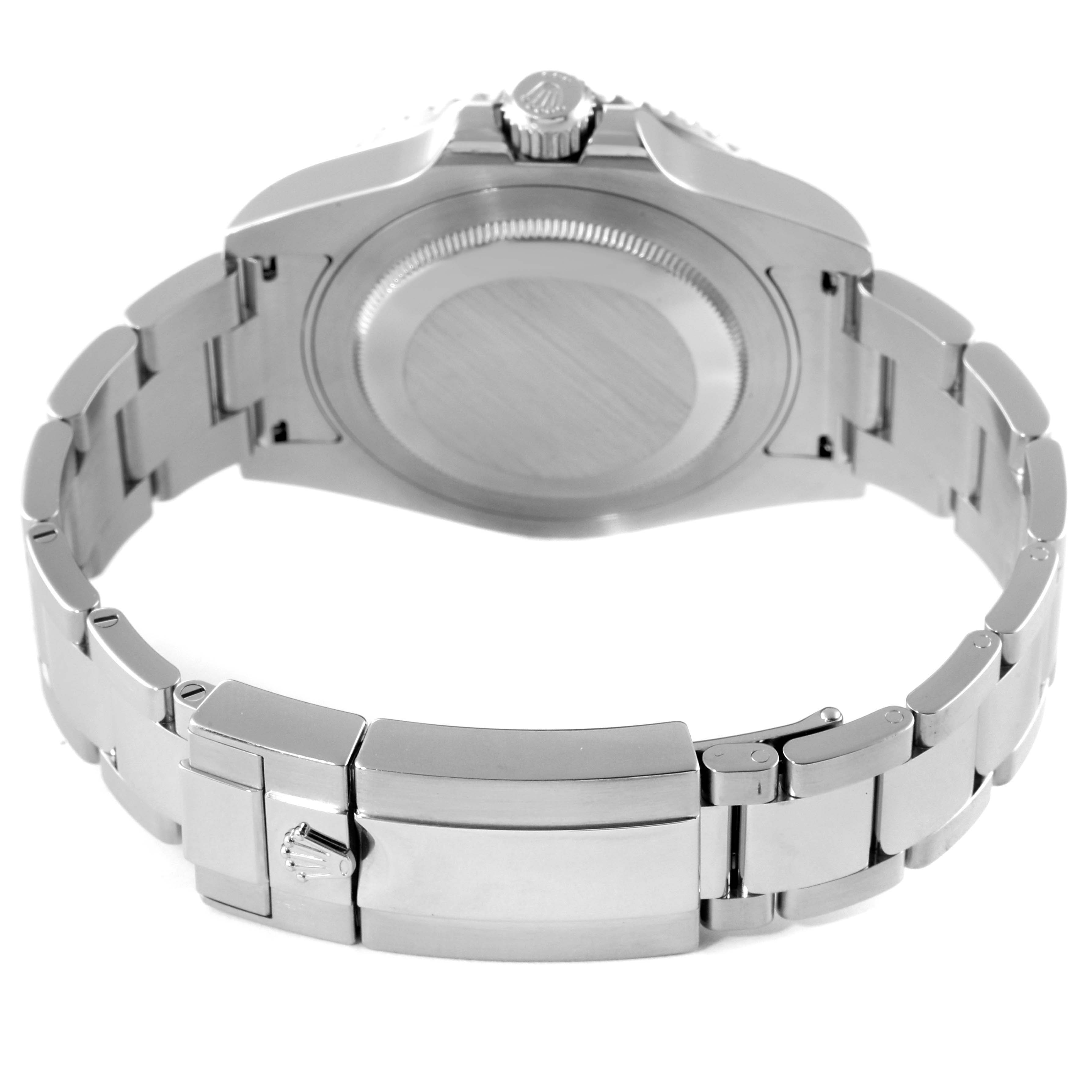 This image shows the back of a Rolex GMT-Master 116710 Men
s Stainless Steel Black Dial 116710 Men
s Stainless Steel Black Dial watch, highlighting the case back and bracelet clasp.