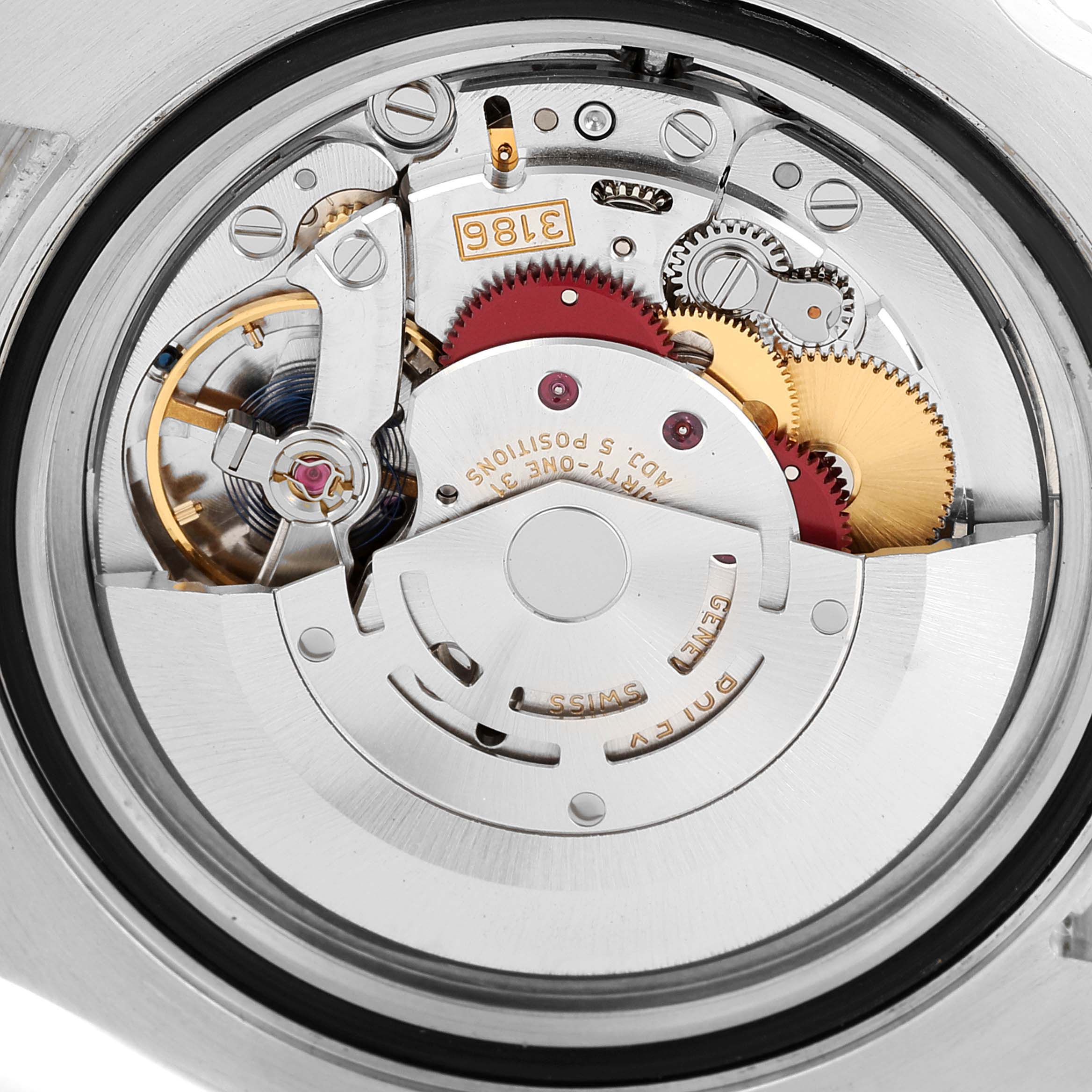 This image shows the intricate internal movement and gears of the Rolex GMT-Master 116710 Men
s Stainless Steel Black Dial 116710 Men
s Stainless Steel Black Dial watch from a rear angle.