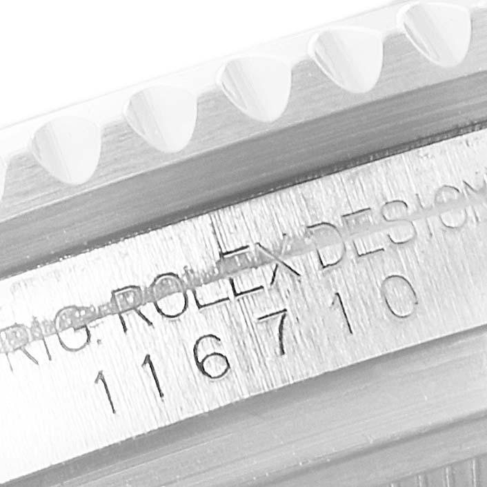 The image shows a close-up of the bezel and case side of a Rolex GMT-Master 116710 Men
s Stainless Steel Black Dial 116710 Men
s Stainless Steel Black Dial watch, revealing the model number 116710.